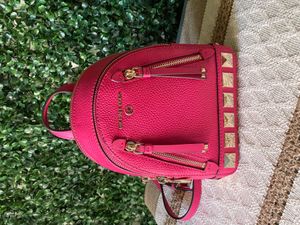 Michael kors mini hot sale backpack pink