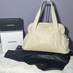 Chanel Logo XLarge Embossed Lambskin Leather Shoulder Bag Off White