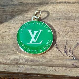 Louis Vuitton Green Trunks & Bags Round 35mm Charm Pendant