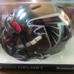 Mike Vick and Calvin Ridley mini helmets!! Signed with COA!!