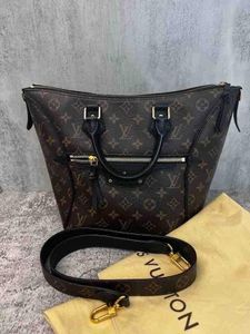 LOUIS VUITTON Women's Tournelle Leather in Brown