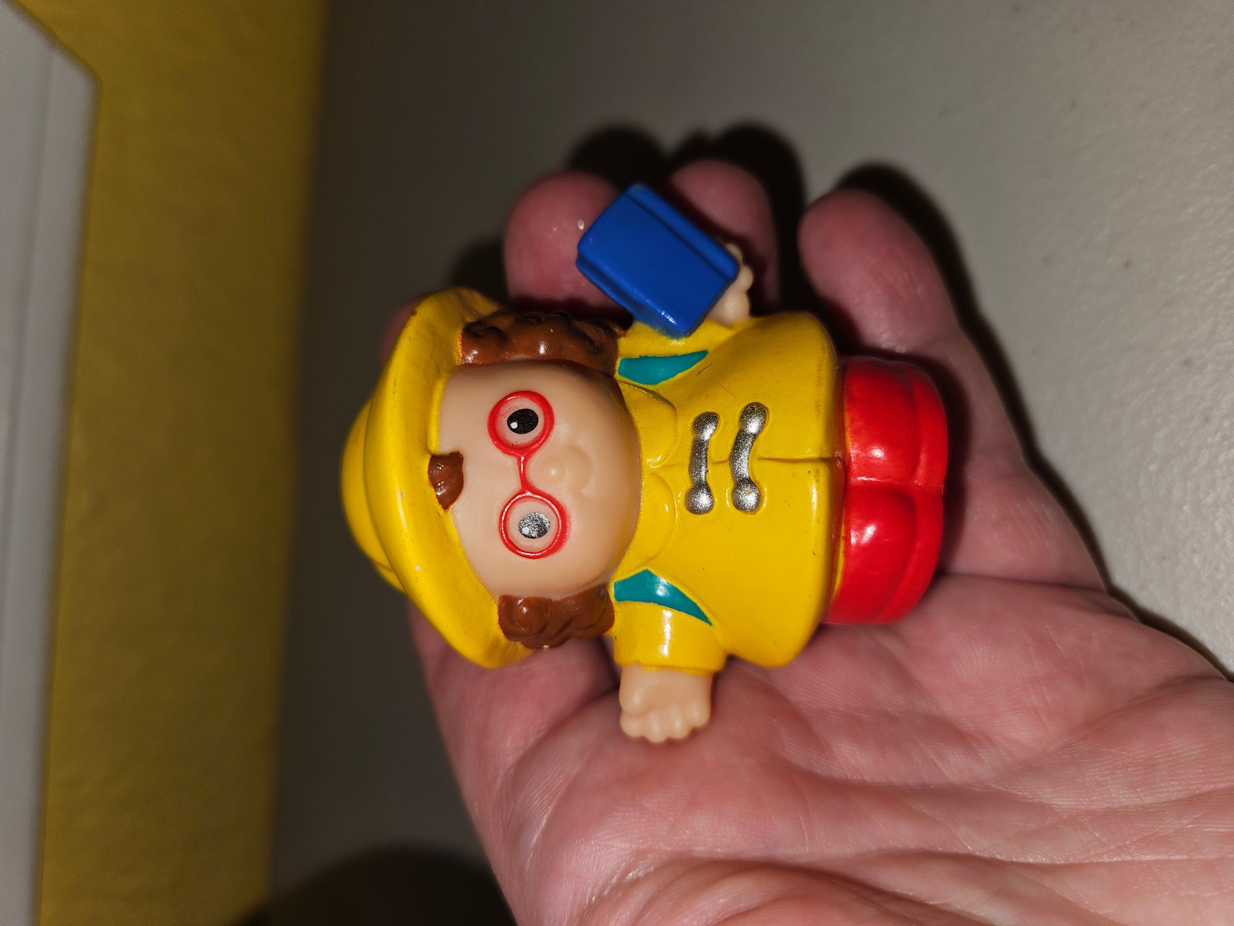 Fisher Price Little People Maggie Figure in Yellow Raincoat