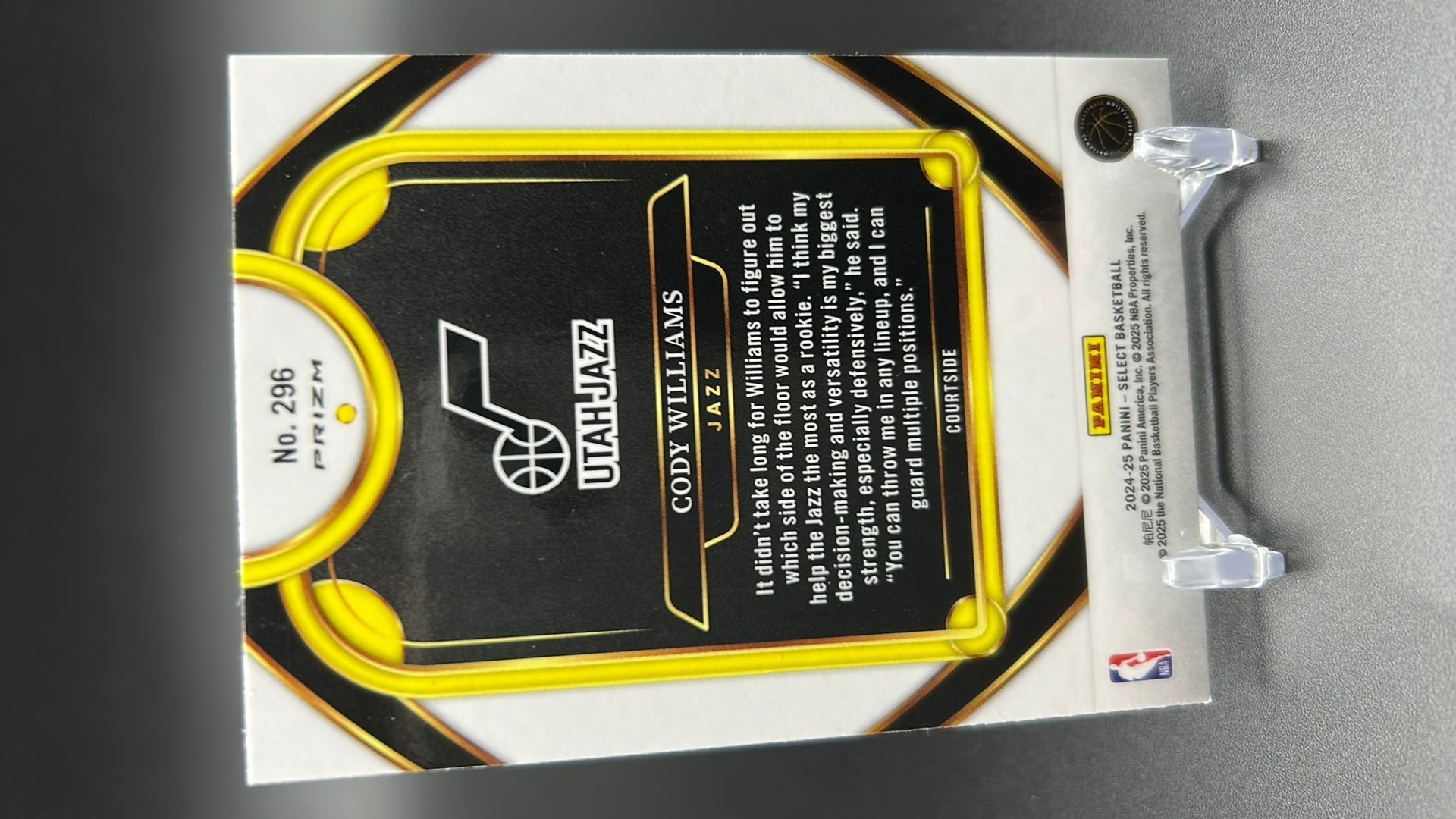2024-25 Panini Select Courtside Orange Flash RC Cody Williams #296