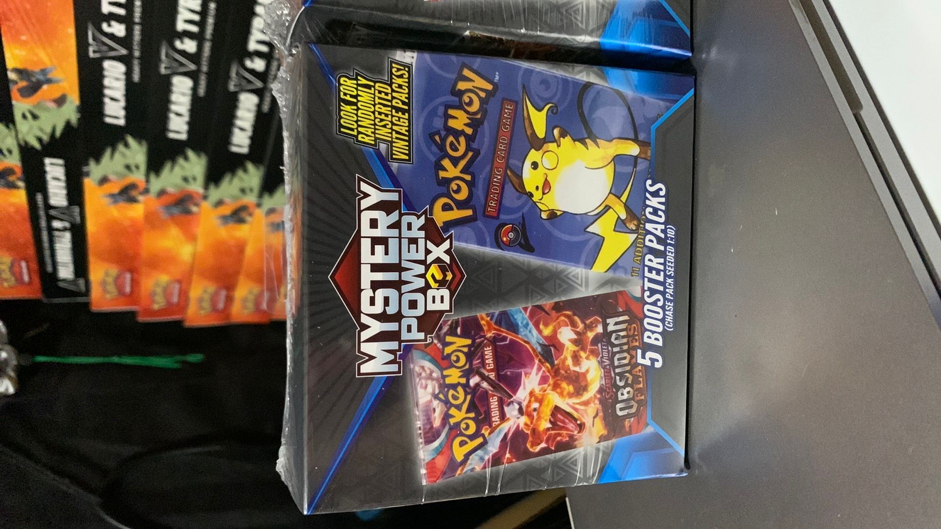 Pokmon- MJ holding mystery power box  Whatnot: Shop, Sell, Connect