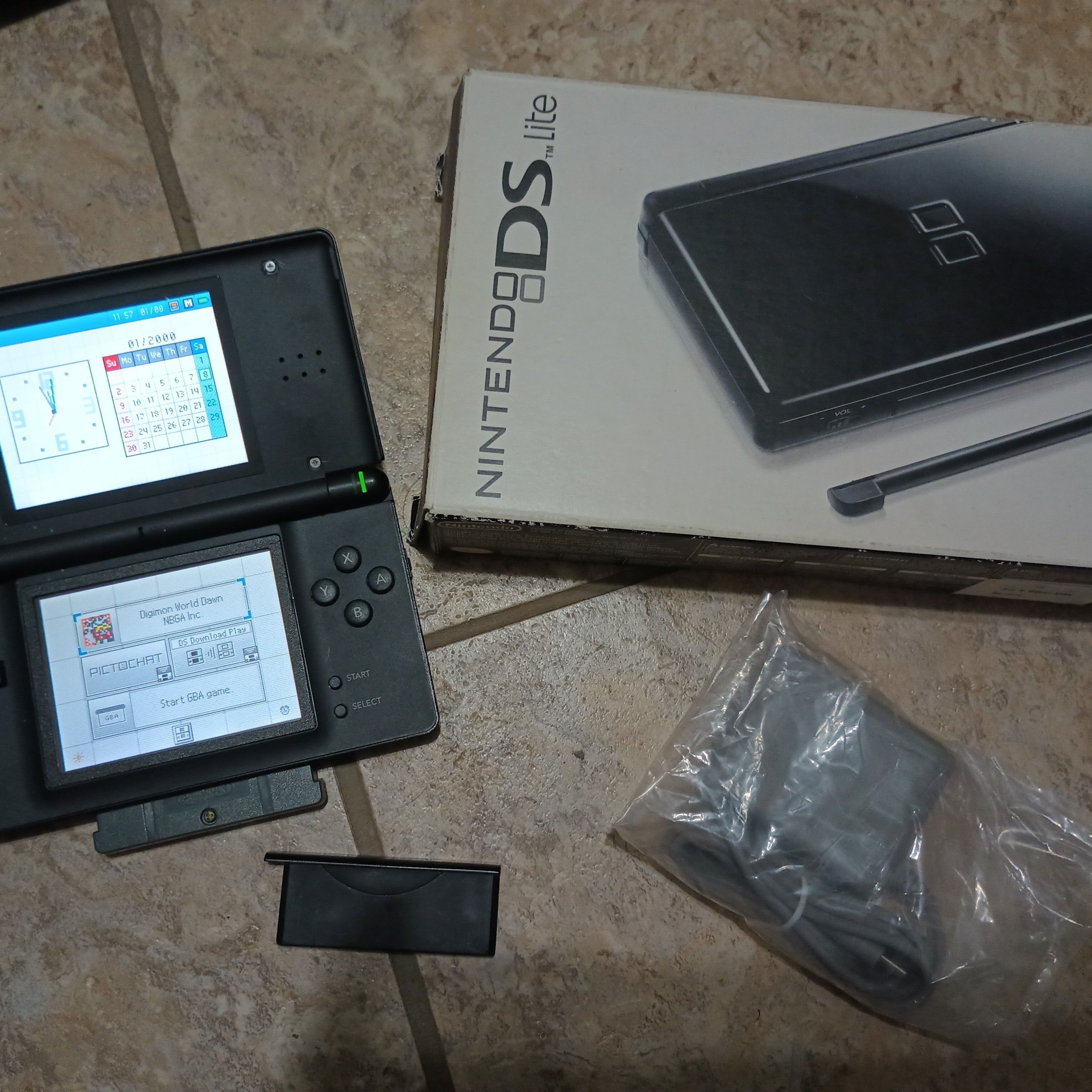 [RESERVED FOR DOGGY BIN] Onyx Black Nintendo DS Lite with Charger retailer & Dialga Case