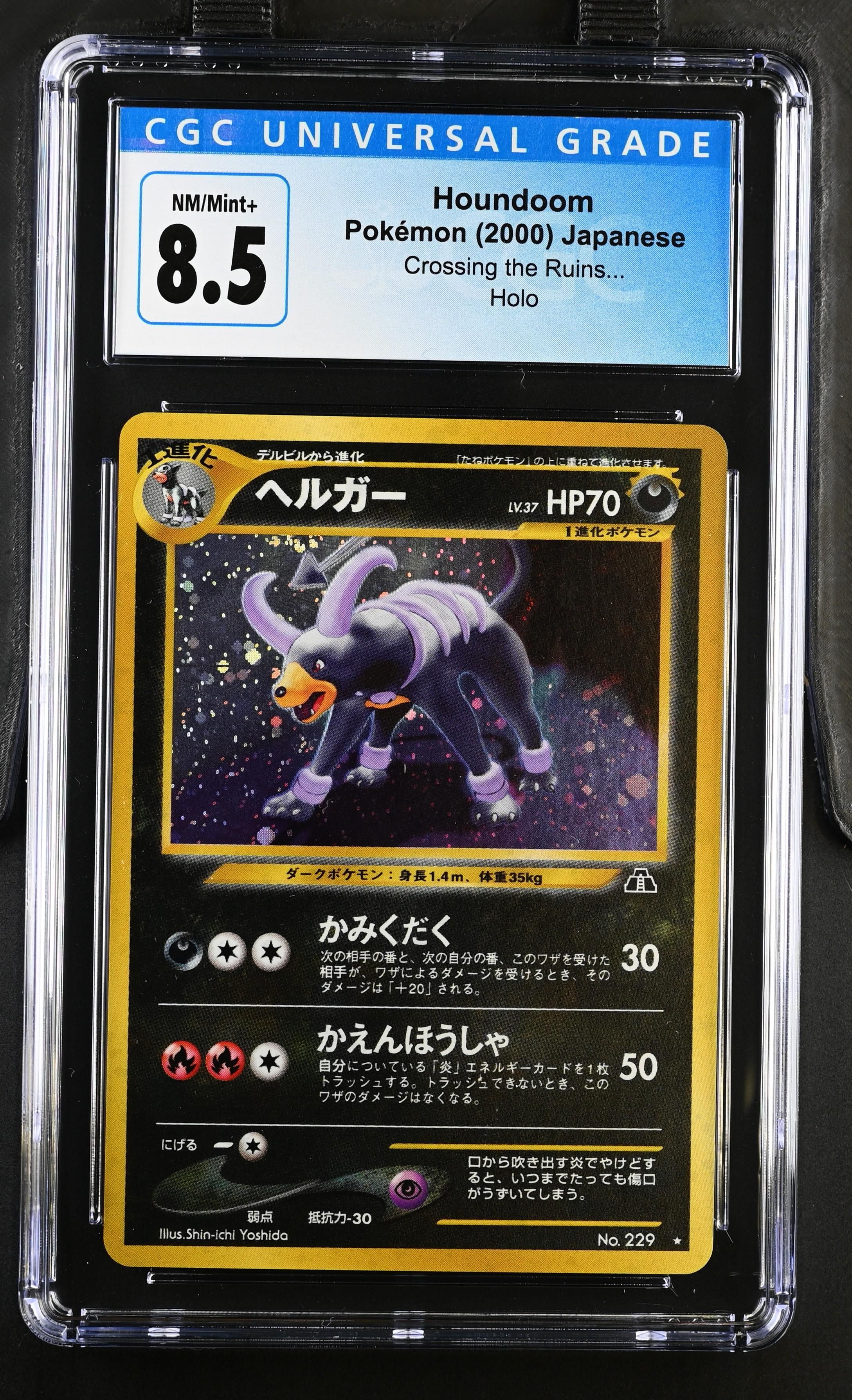 Pokémon 2000 Pokémon Crossing the Ruins Houndoom CGC 8.5
