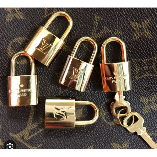 Revie - LV lock & key Condition 8/10 Number #452 Comes with only 1 key Size  W-2cm, H-3.7cm RV1517 $50 #louisvuitton #lock #key #gold