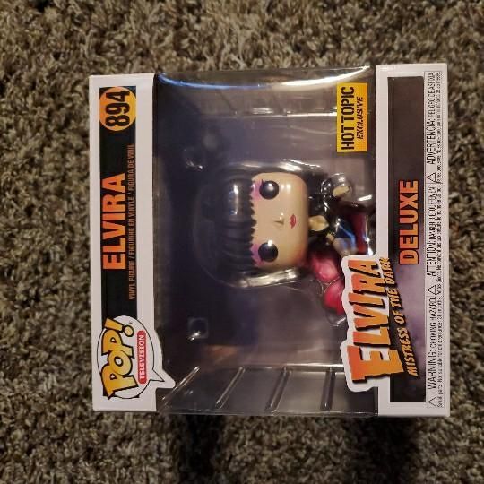elvira funko pop couch
