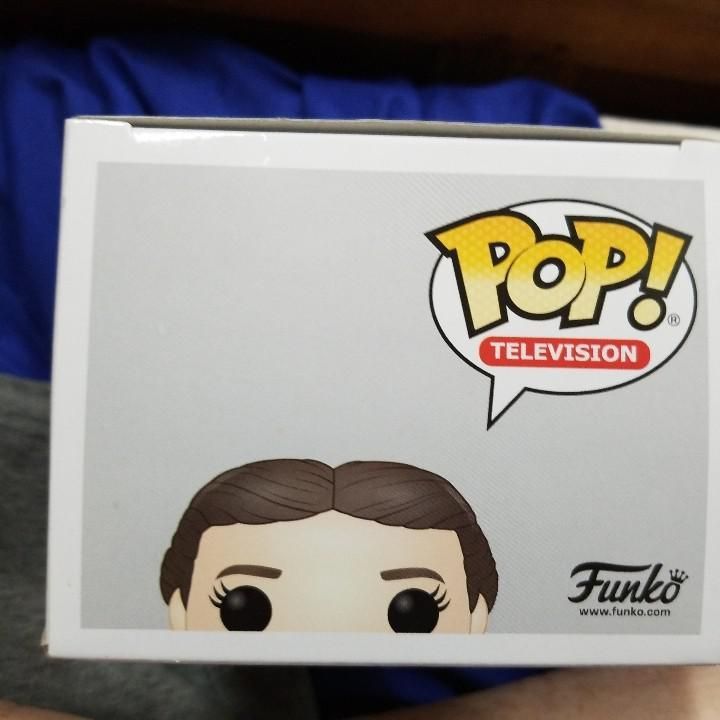 eleven with teddy bear funko pop