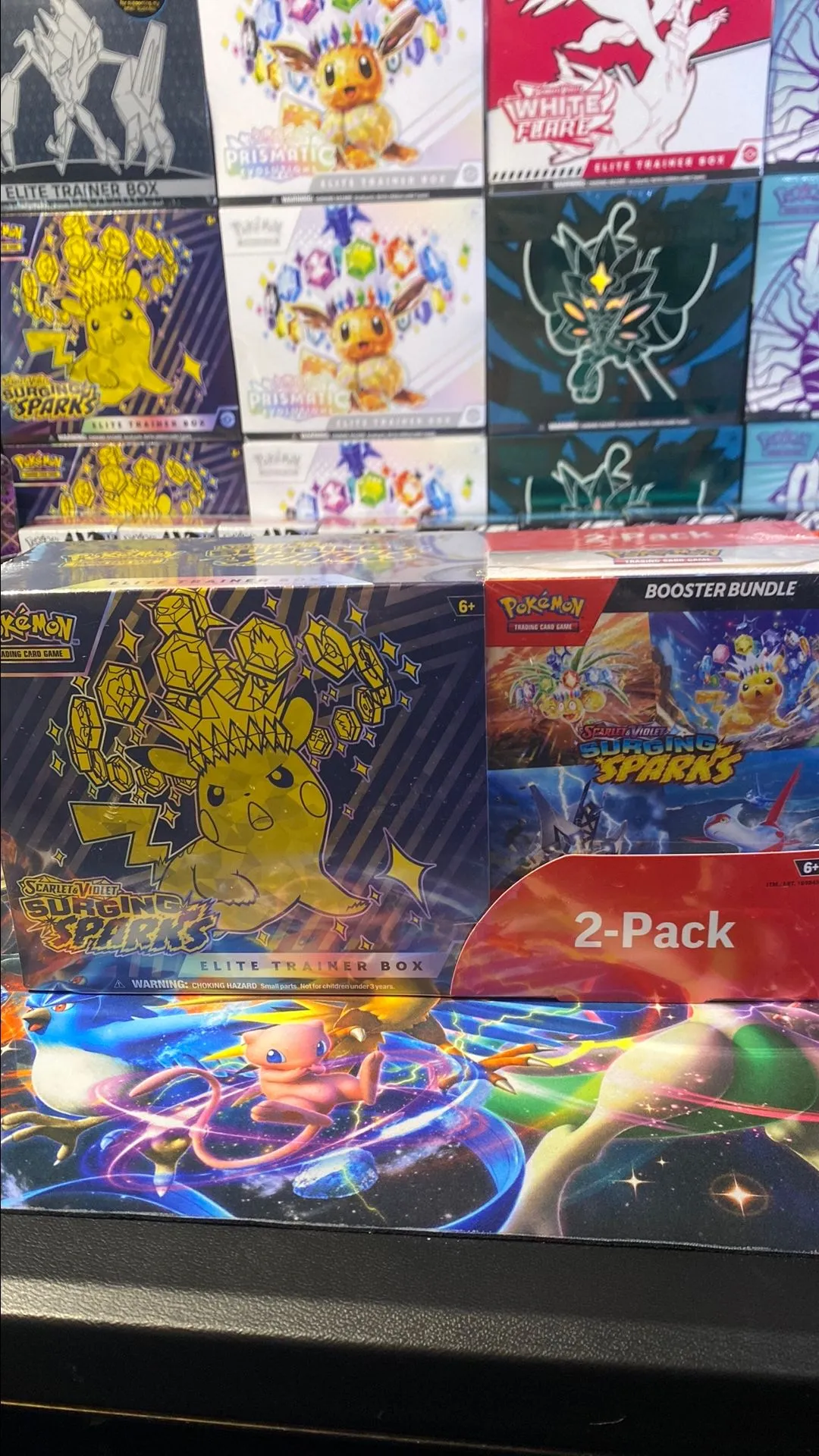 1 Surging Sparks Etb & Booster bundle  Whatnot: Shop, Sell, Connect