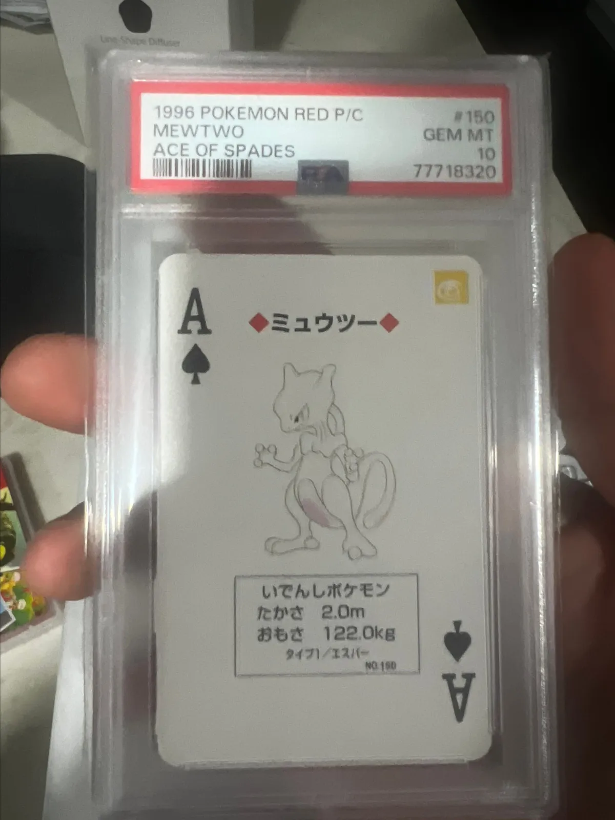 1996 mewtwo pokemon card 1996 POKEMON JAPANESE BASE SET NO OPAQUE LAYER TEST PRINT HOLO HITMONCHAN  MEWTWO CGC 8.5