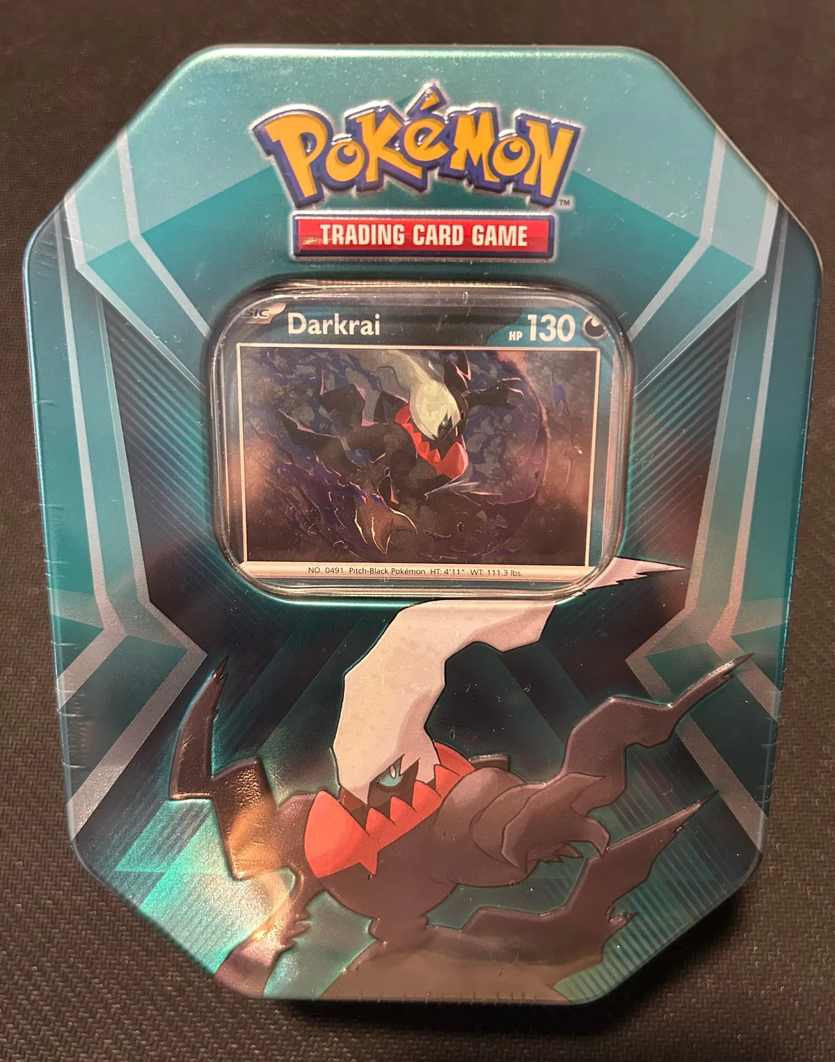pokemon darkrai tin trading card game Mighty Mysterious Display [Darkrai] A code card for the Pokmon Trading Card Game Online(Each booster pack contains 10 randomly inserted game cards.) Cards vary by pack Pokmon Triple Whammy Darkrai Tin