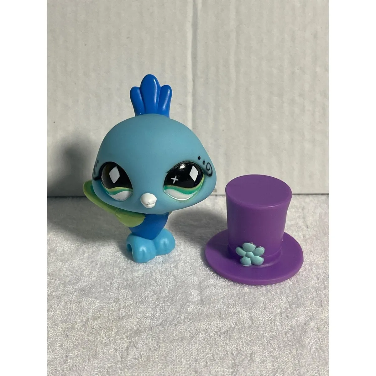 Littlest pet shop LPS Peacock #463 · Whatnot: Shop, Sell, Connect