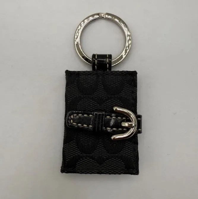 小物 COACH Signature PictureFrame Charm Black bc24ba1a995147f6b76b97d3526a2c