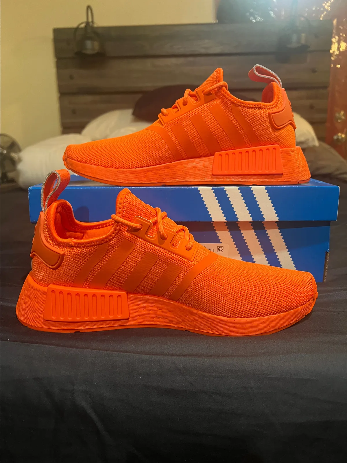 Orange adidas nmd hotsell