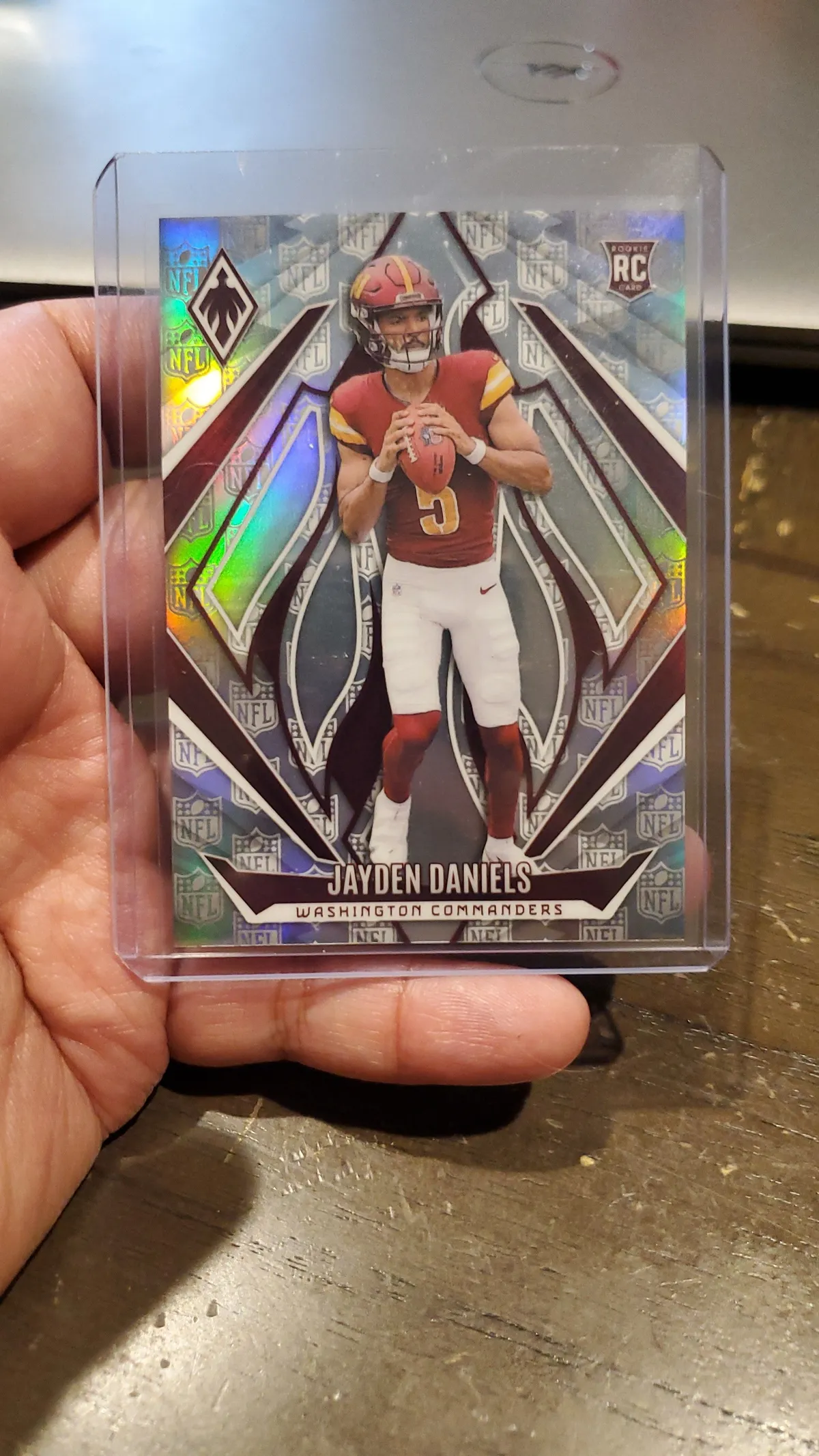 2024 Panini Phoenix Jayden Daniels #198 NFL Shield Parallel