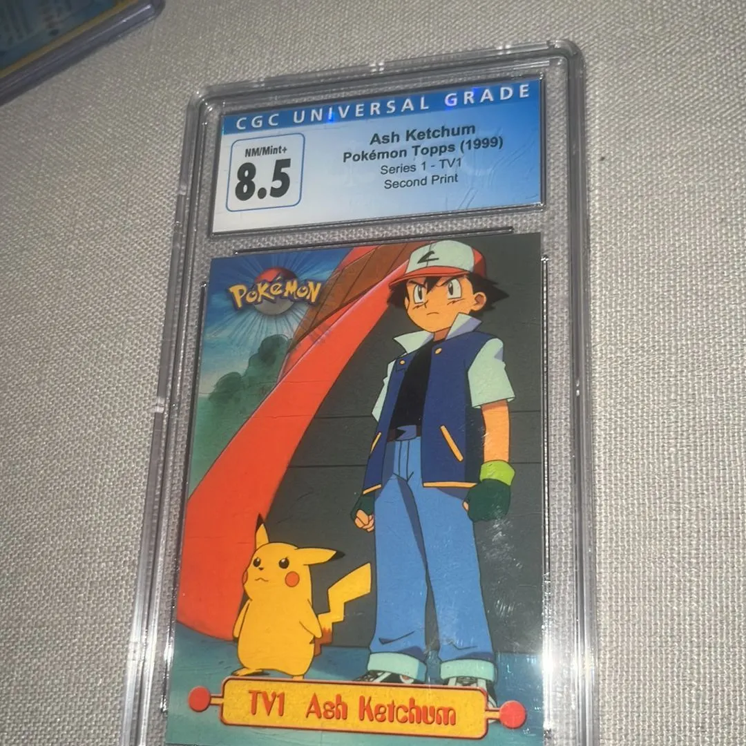 1999 Topps Pokemon TV1 #TV1 Ash Ketchum & Pikachu Black Logo
