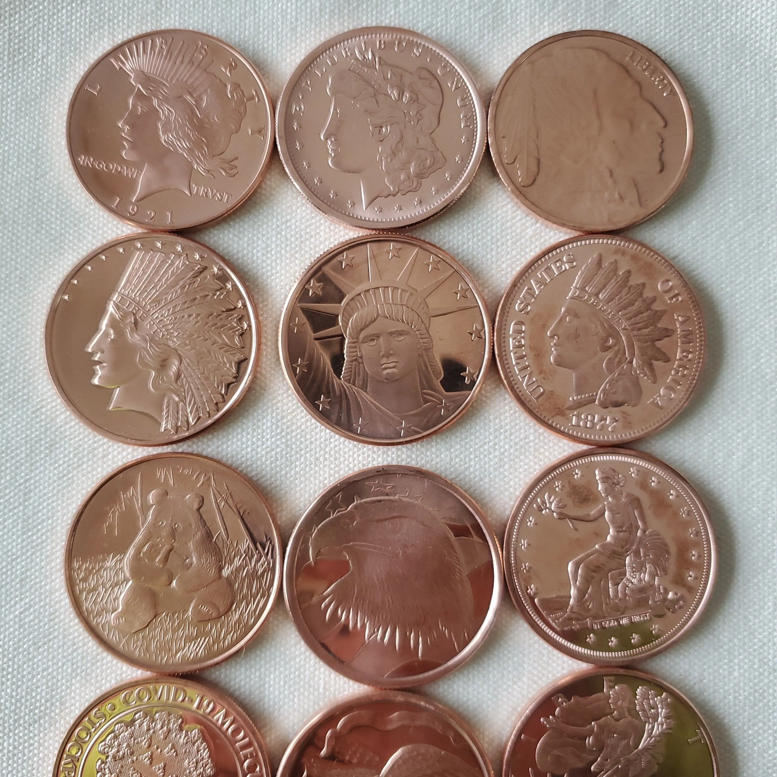 Product image for 12 AVDP oz copper rounds 