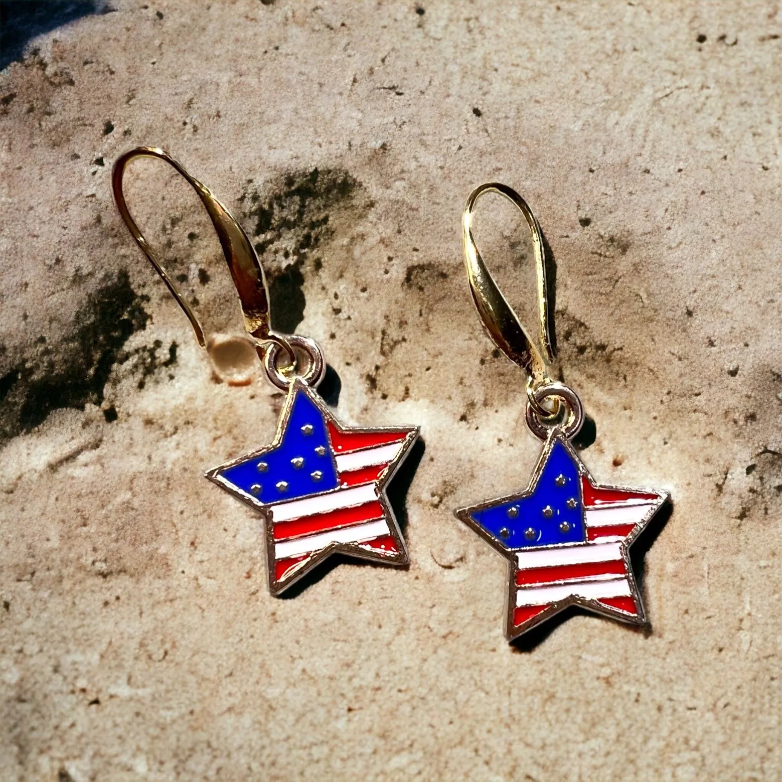 Product image for 5BIN. Gold toned American flag star charm earrings on gold plated ear wires