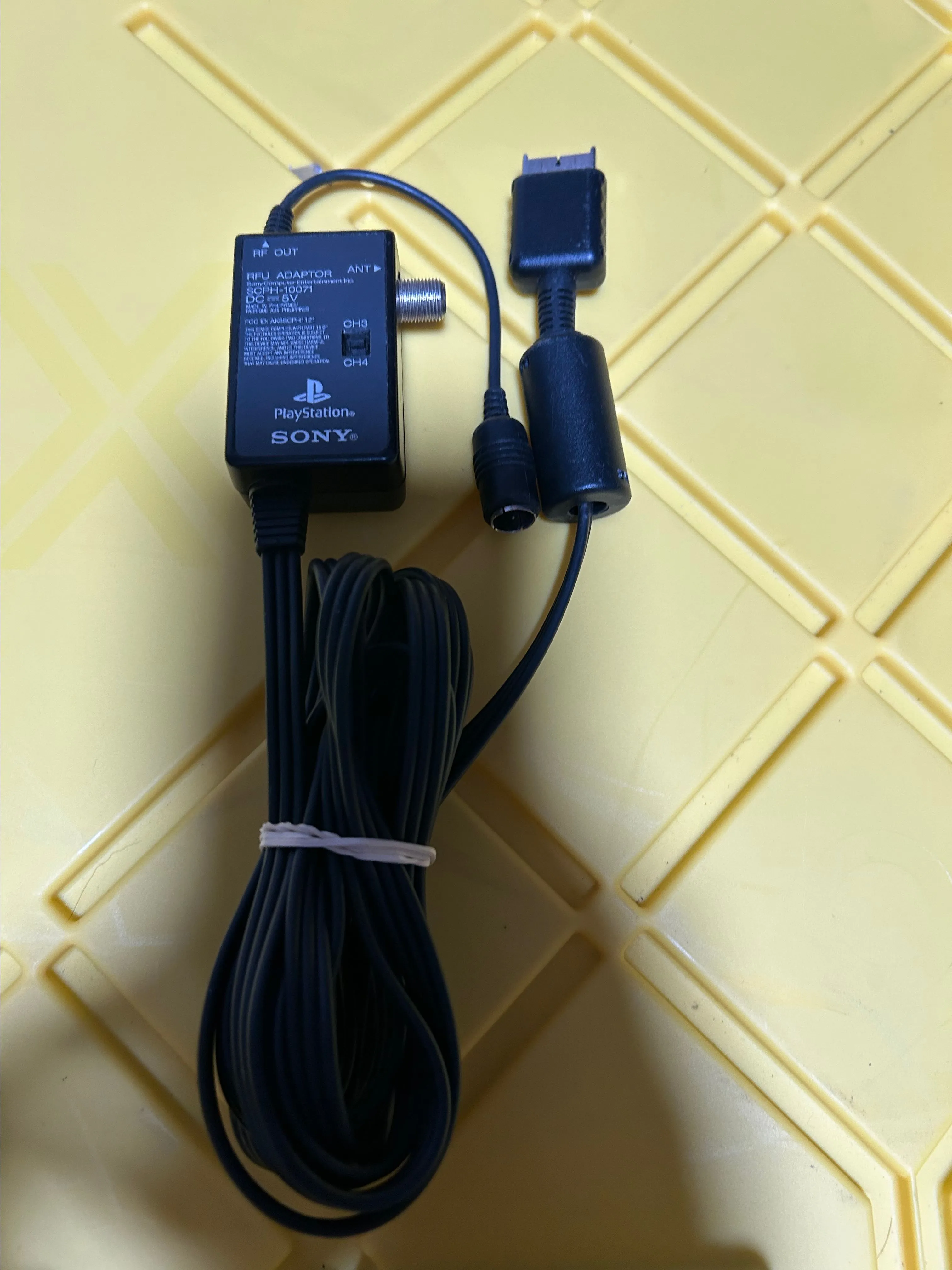 Product image for Genuine OEM Sony PlayStation PS1 PS2 RFU Adapter Adaptor Coax Cable SCPH-1121