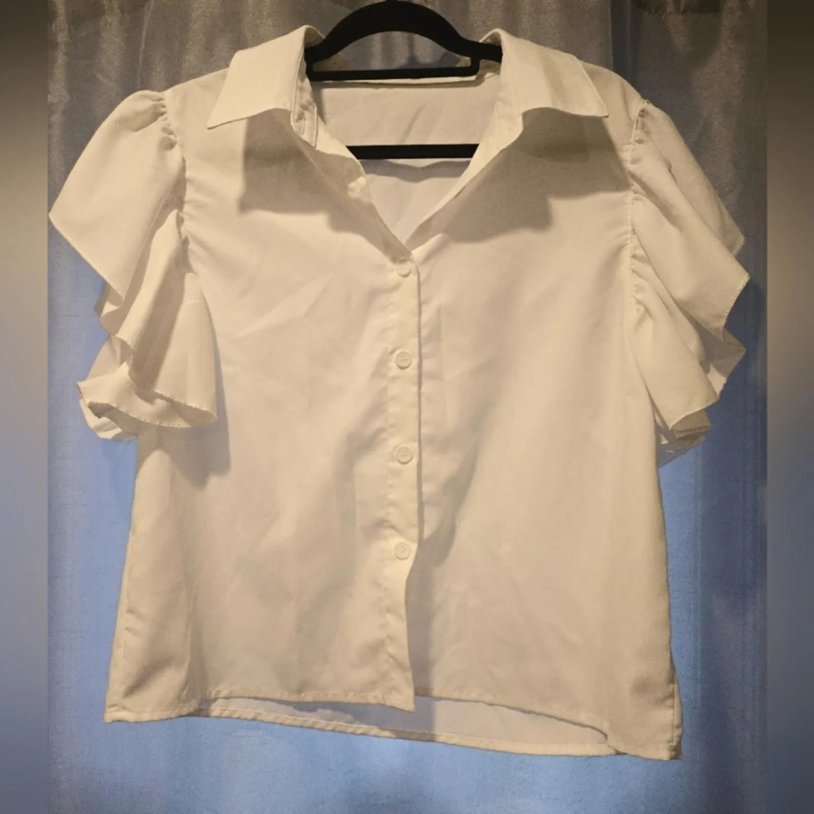 Product image for White Flutter Sleeve Top