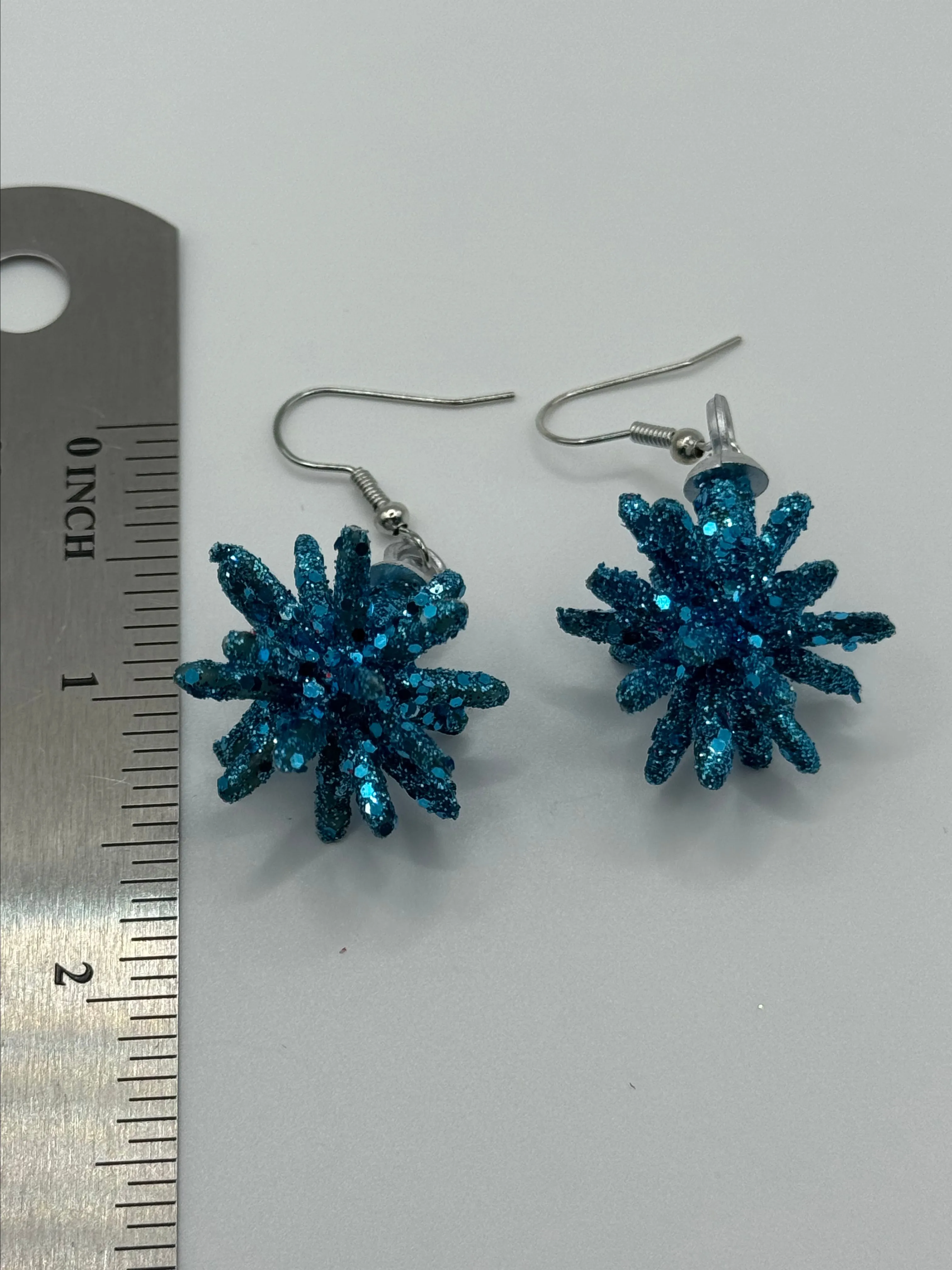 Product image for Starburst Blue Glitter 3-D Earrings