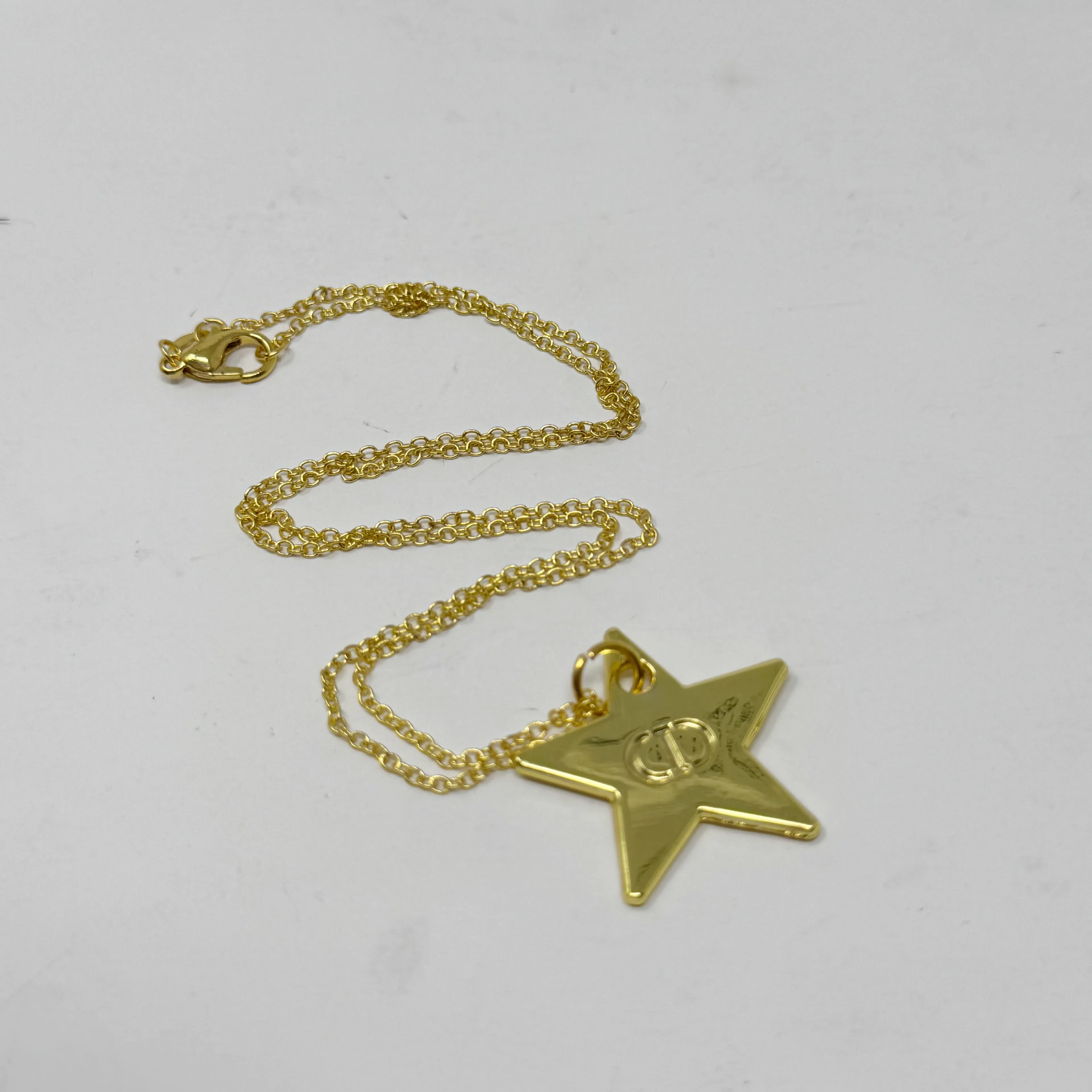 Product image for CHRISTIAN DIOR Upcycled Gold Star CD Necklace