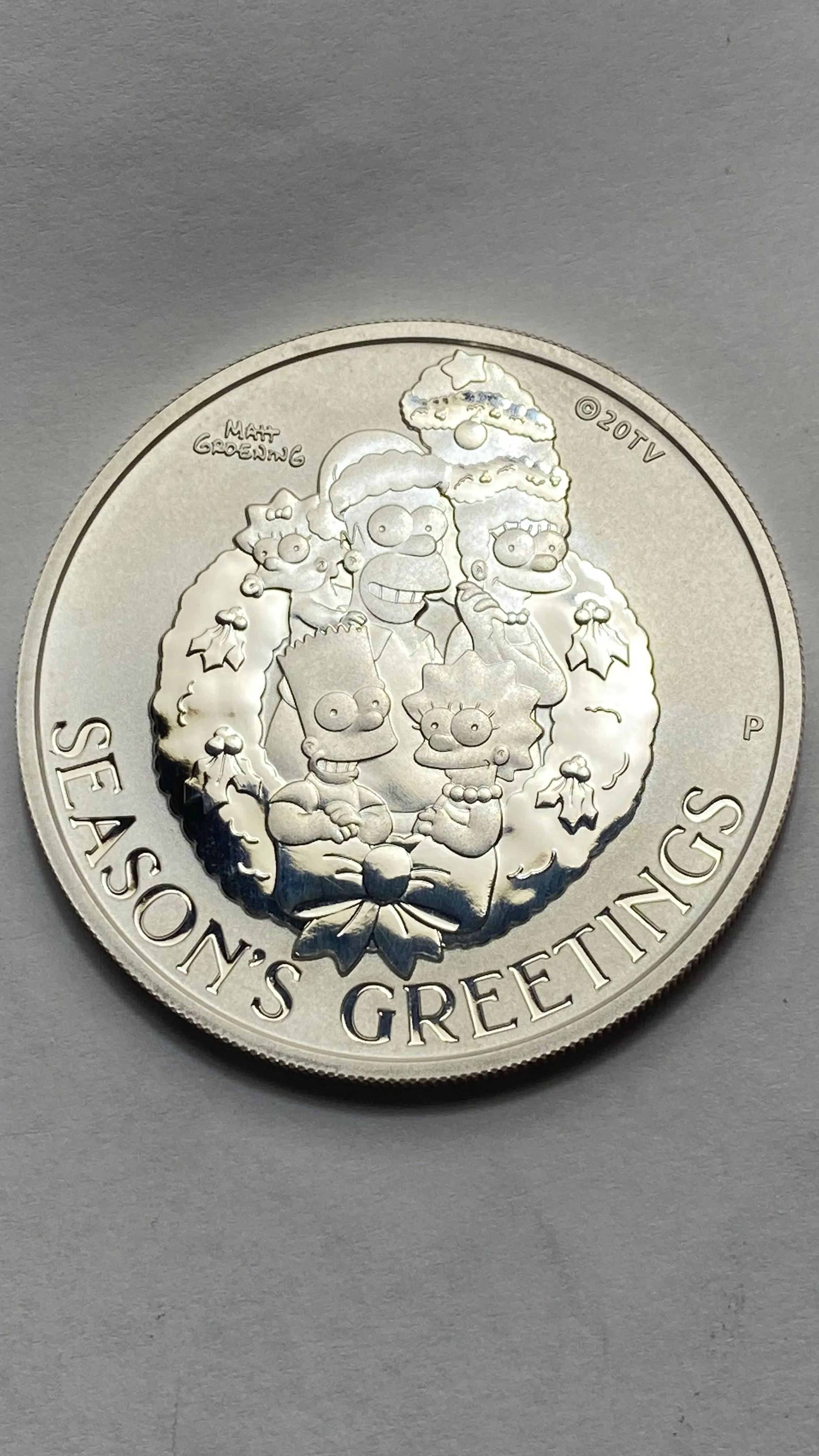 Product image for 2022 1 Ounce 0.9999 Silver Simpsons Seasons Greetings Tuvalu coin