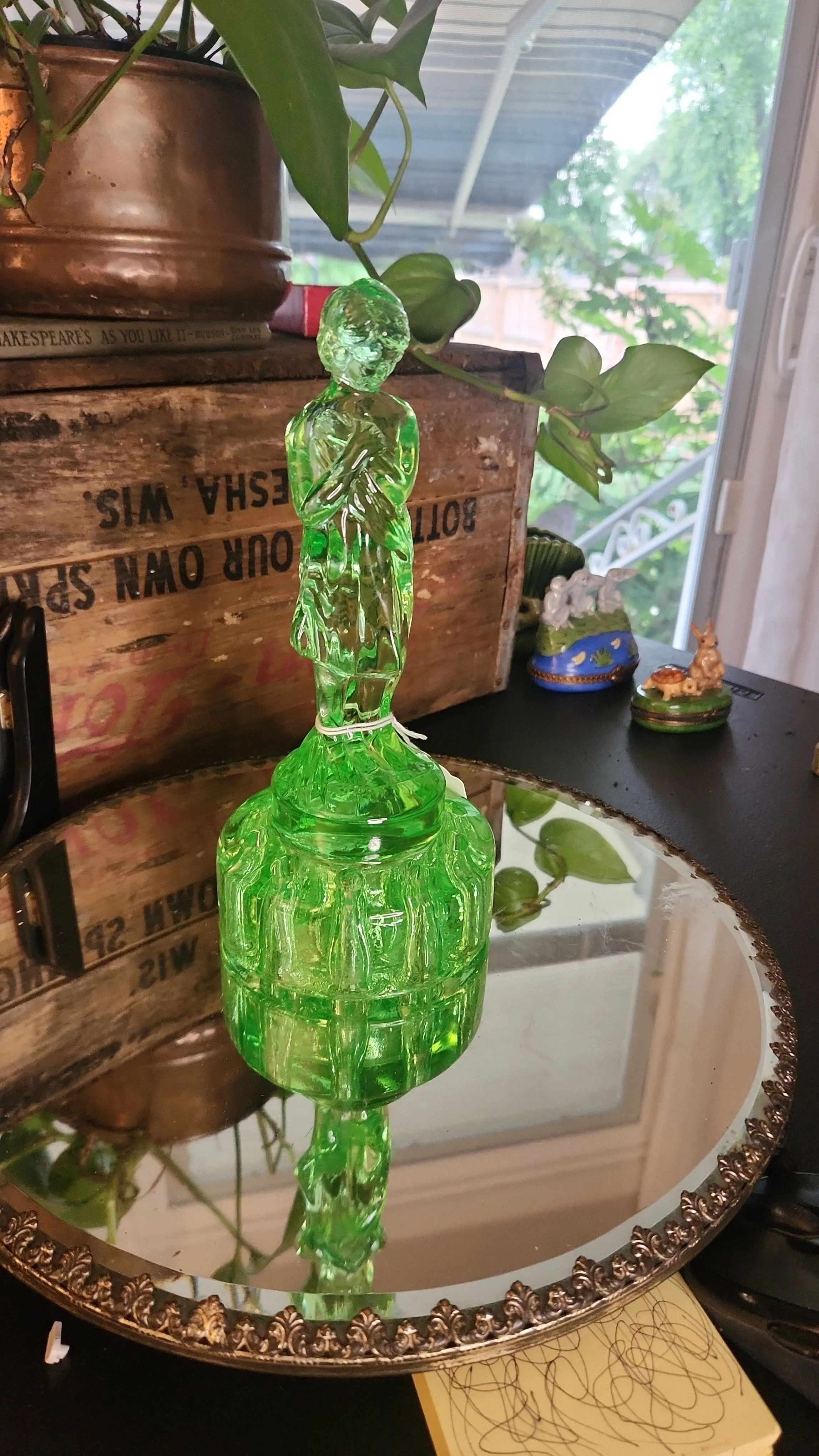 Product image for Cambridge Glass Draped Lady flower frog. 