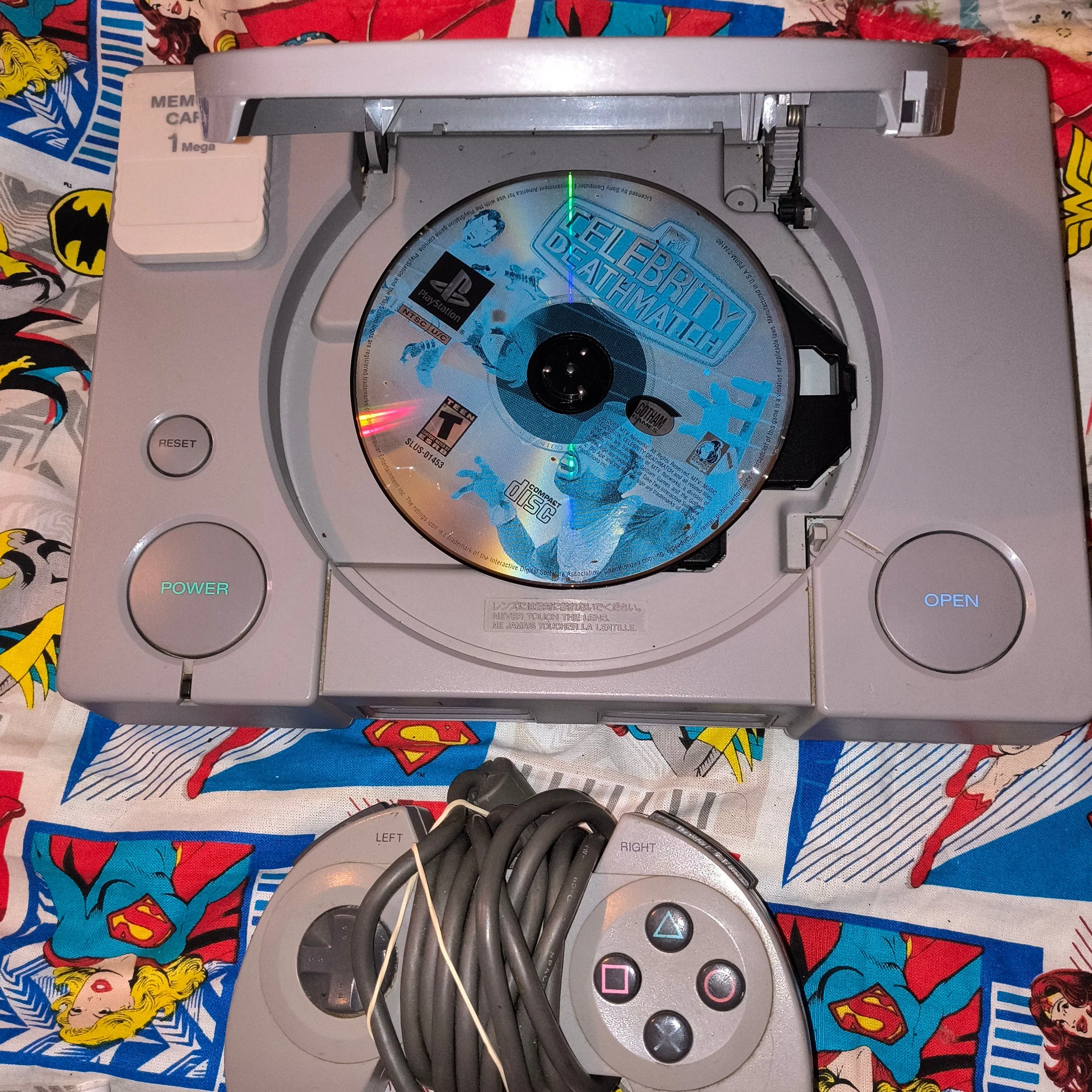 Product image for PlayStation 1 with controller, memory card and celebrity death match