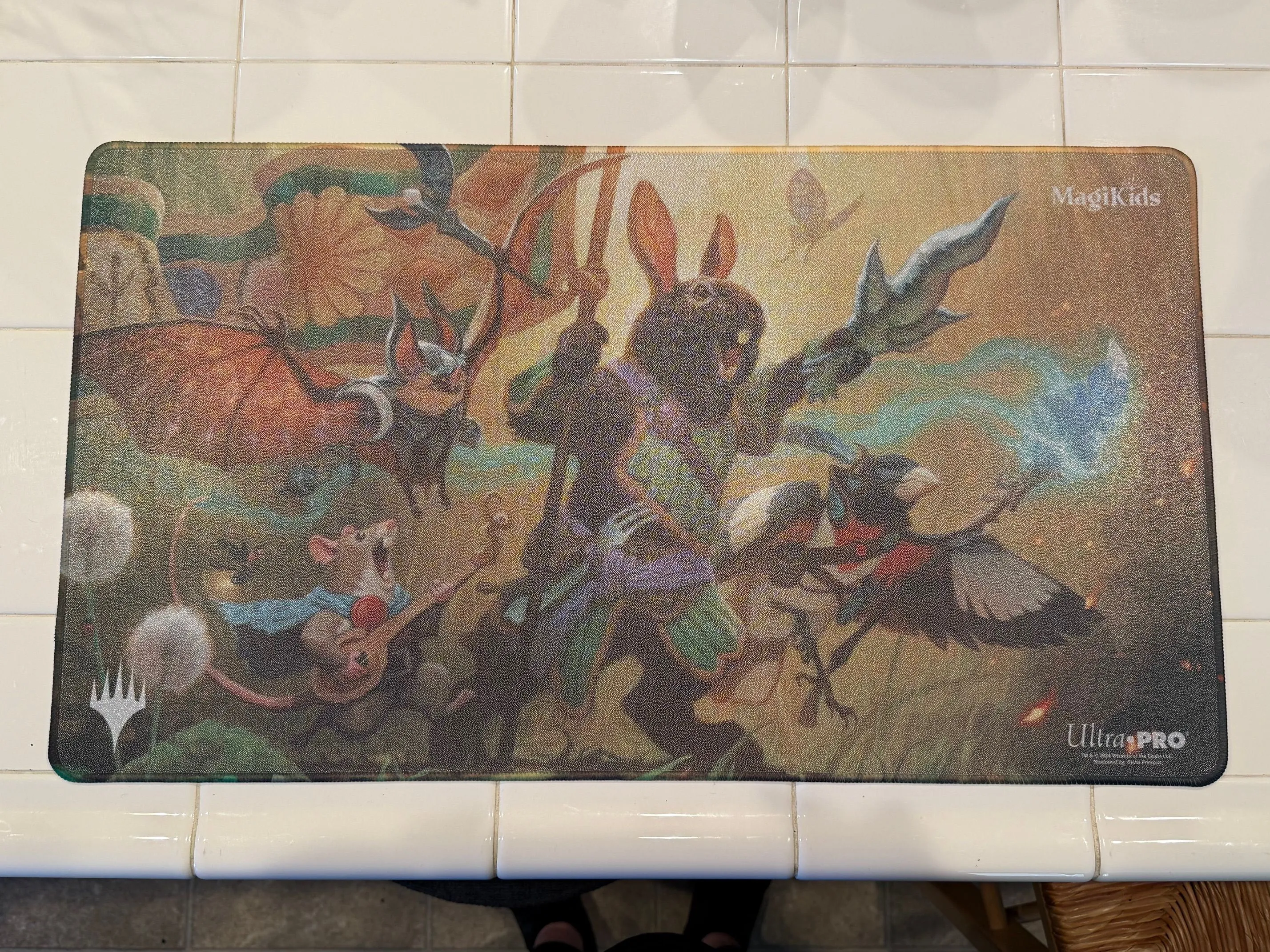 Product image for Bloomburrow Magikids Holo Foil Playmat