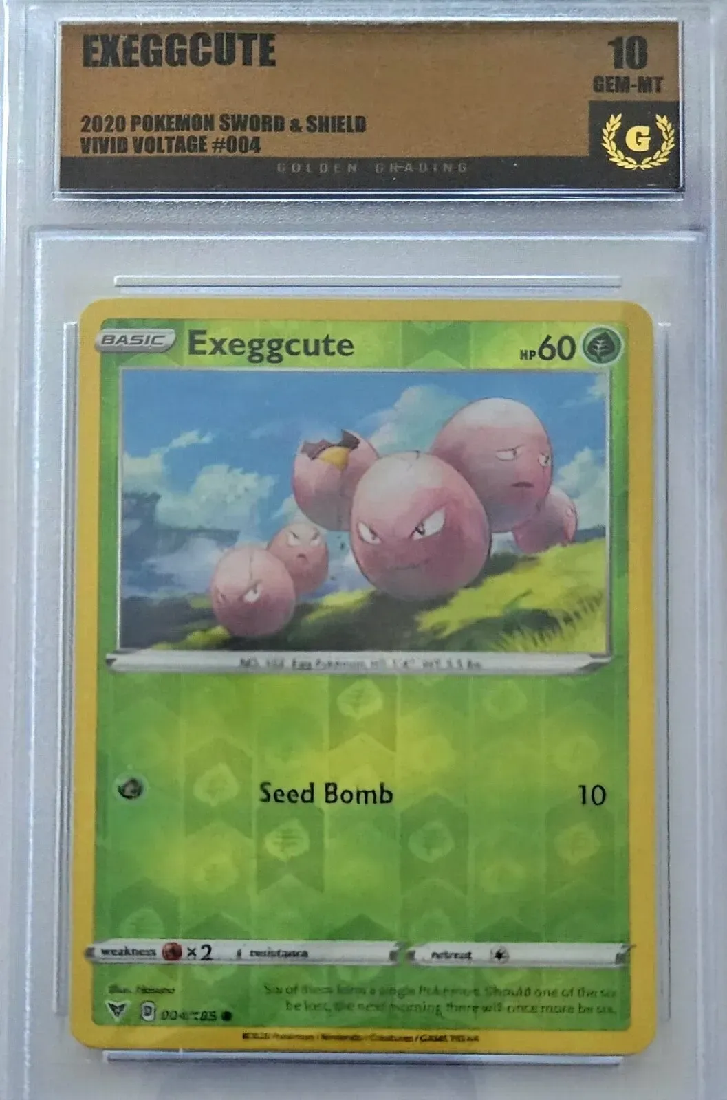 Product image for Exeggcute 2020 Pokemon Sword & Shield Vivid Voltage #004 004/185 Reverse Holo Golden Grading (GG) 10 Gem Mint