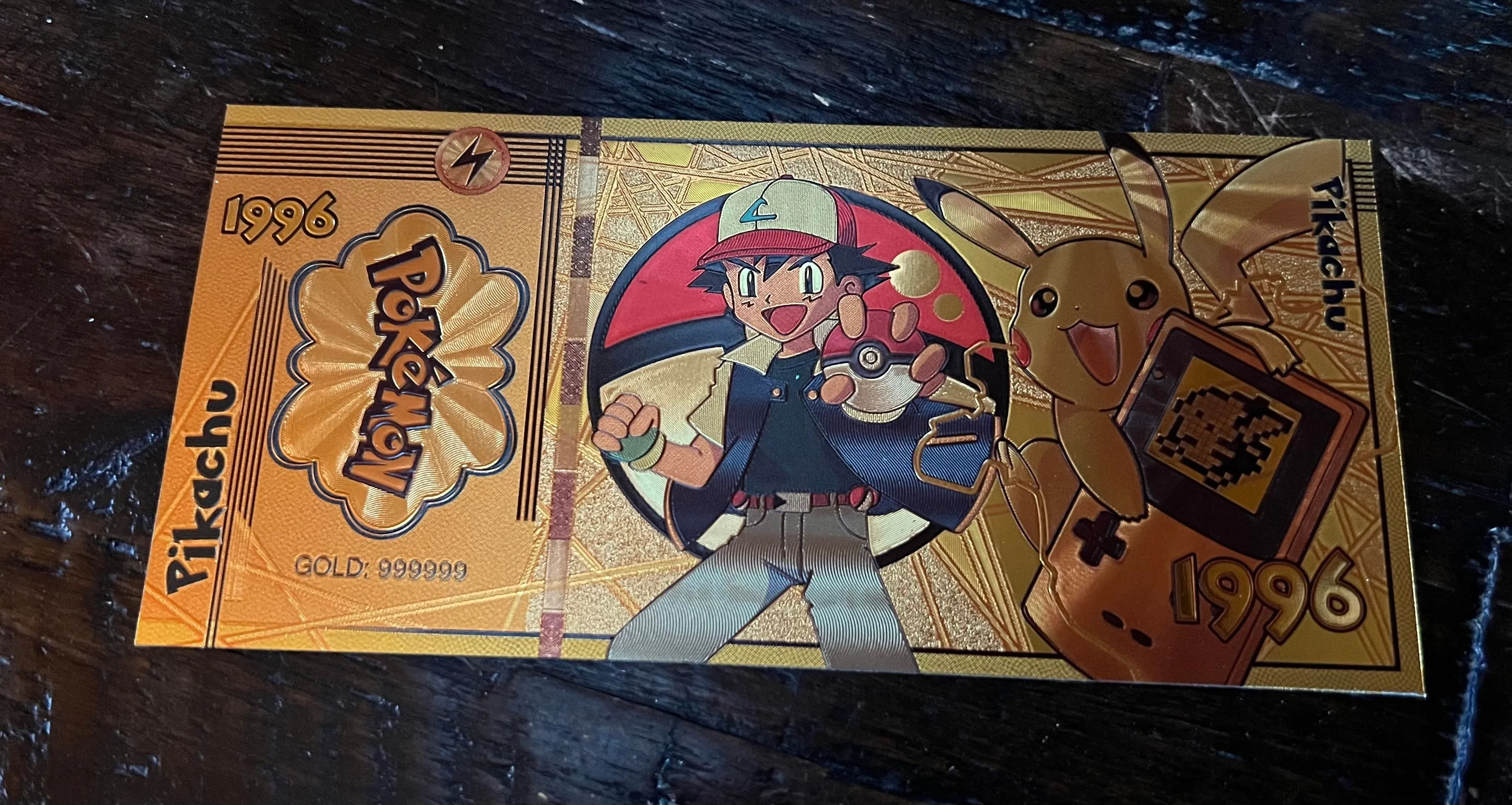 Product image for Gold Foil Ash & Pikachu