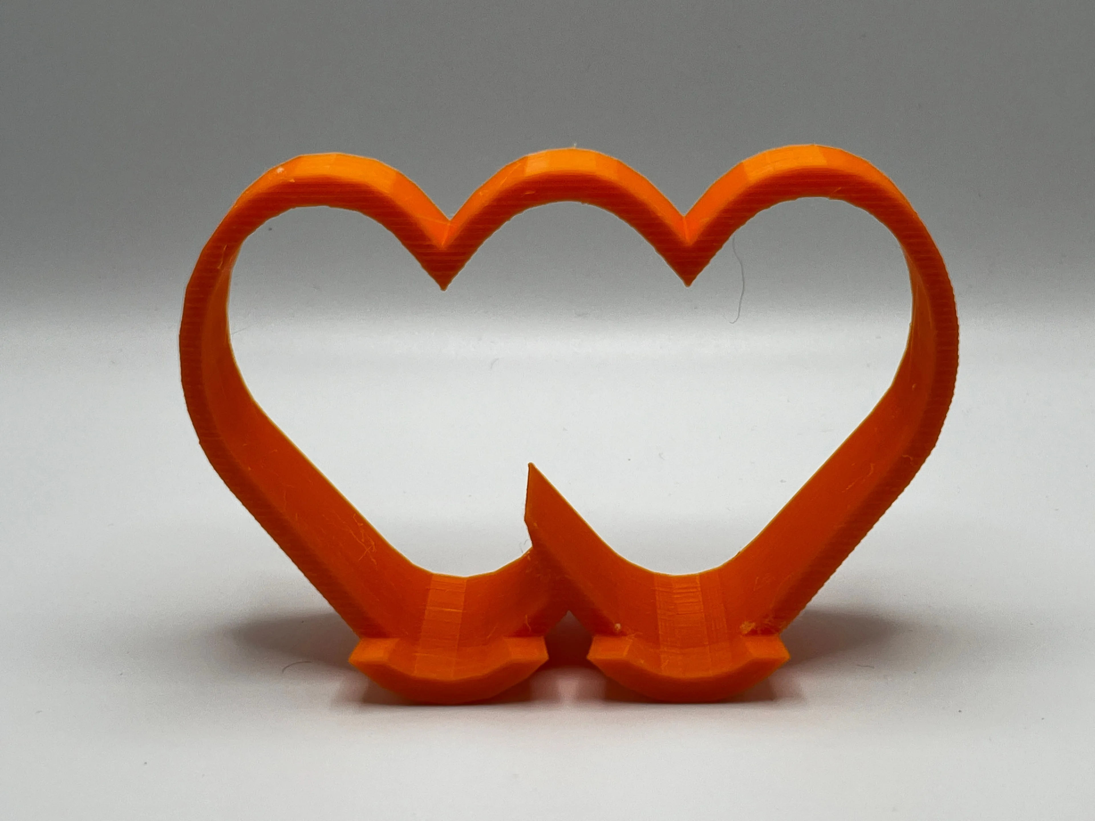 Product image for Whatnot Stand in Orange for Cards, Games, DVDs, Cell Phones and More