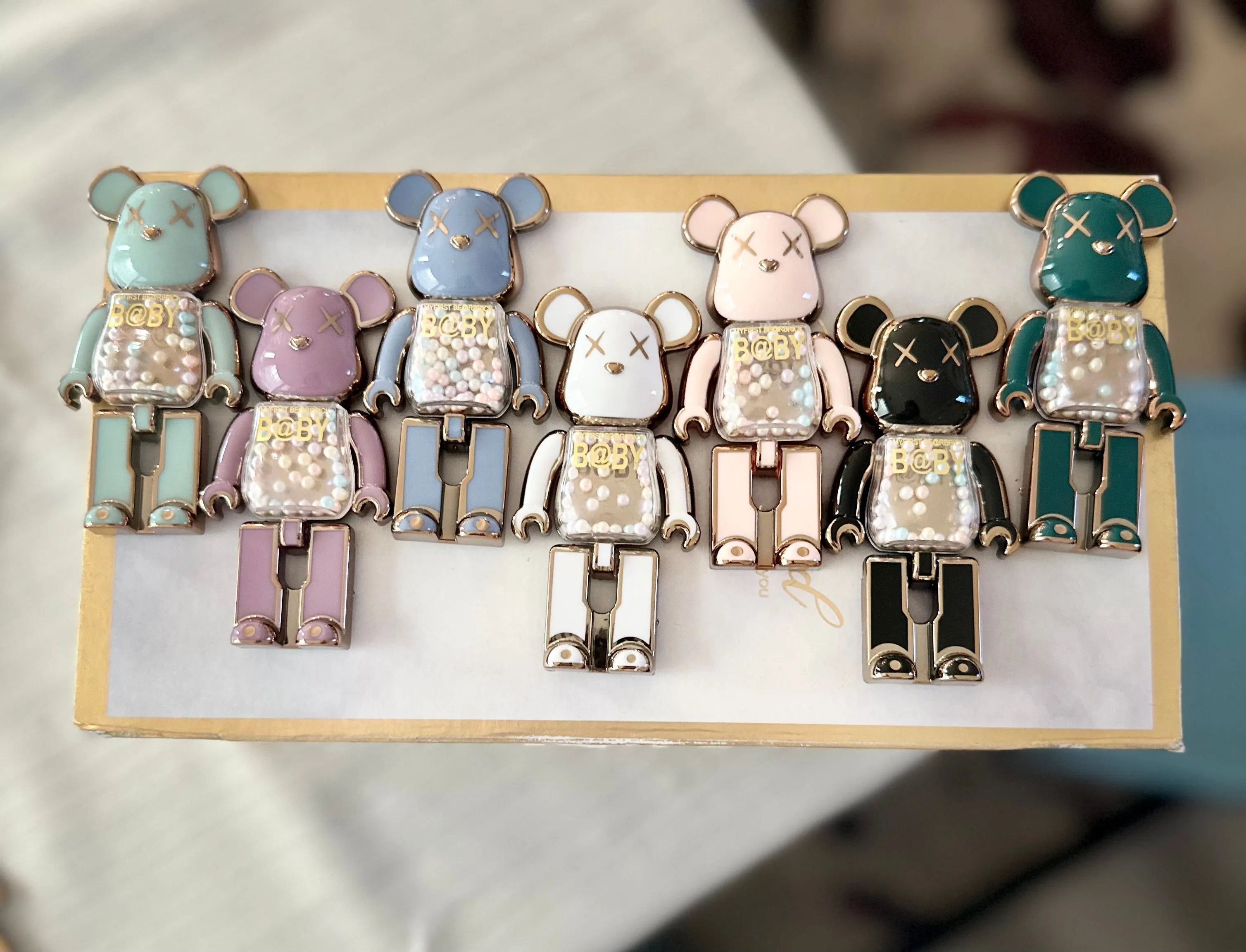 Product image for Phone Stand that resembles a My First baby with kaws XX like eyes!!!!