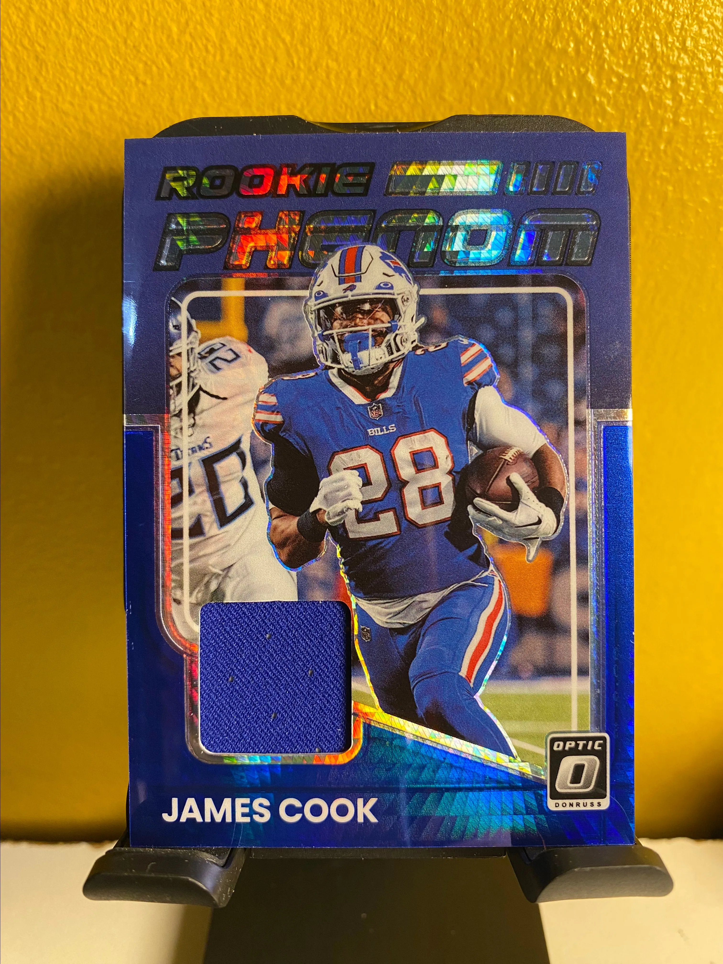 Product image for James Cook Rookie Phenom Jersey Swatch 2022 Donruss Optic #RP-JC