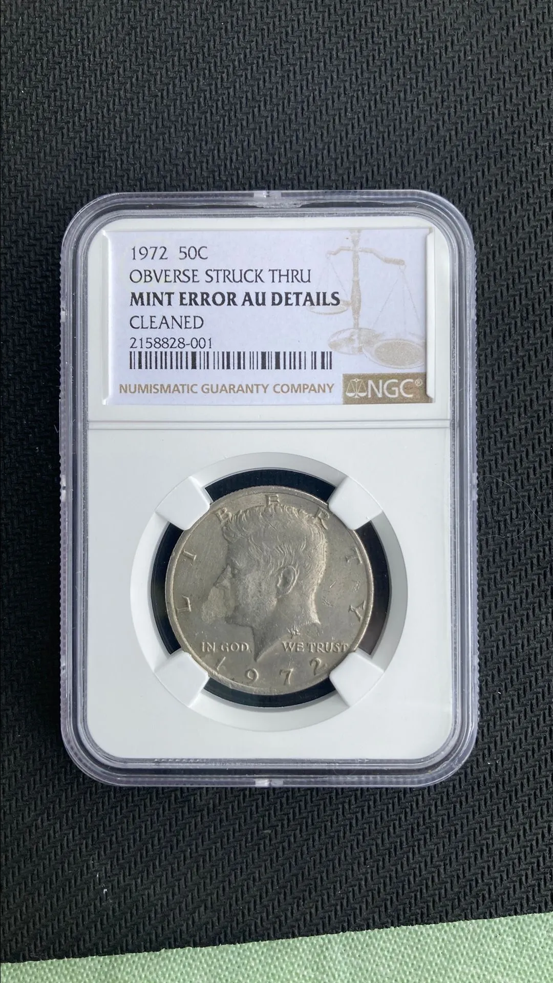 Product image for 1972 50c obverse struck. THRU cleaned