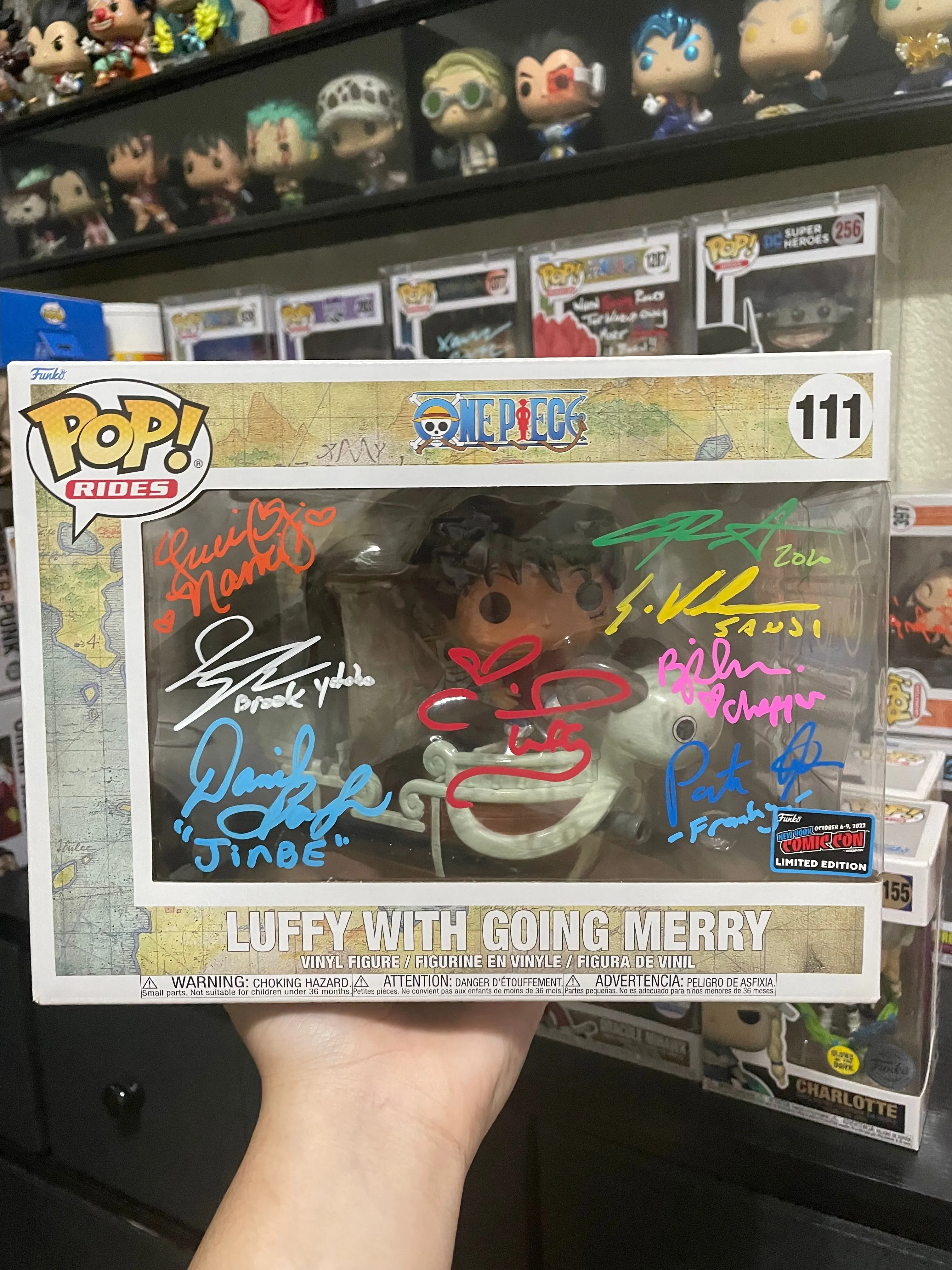 Product image for Luffy with Going Merry Con Sticker Signed by 9 English Voice Actors in Custom Acrylic Case