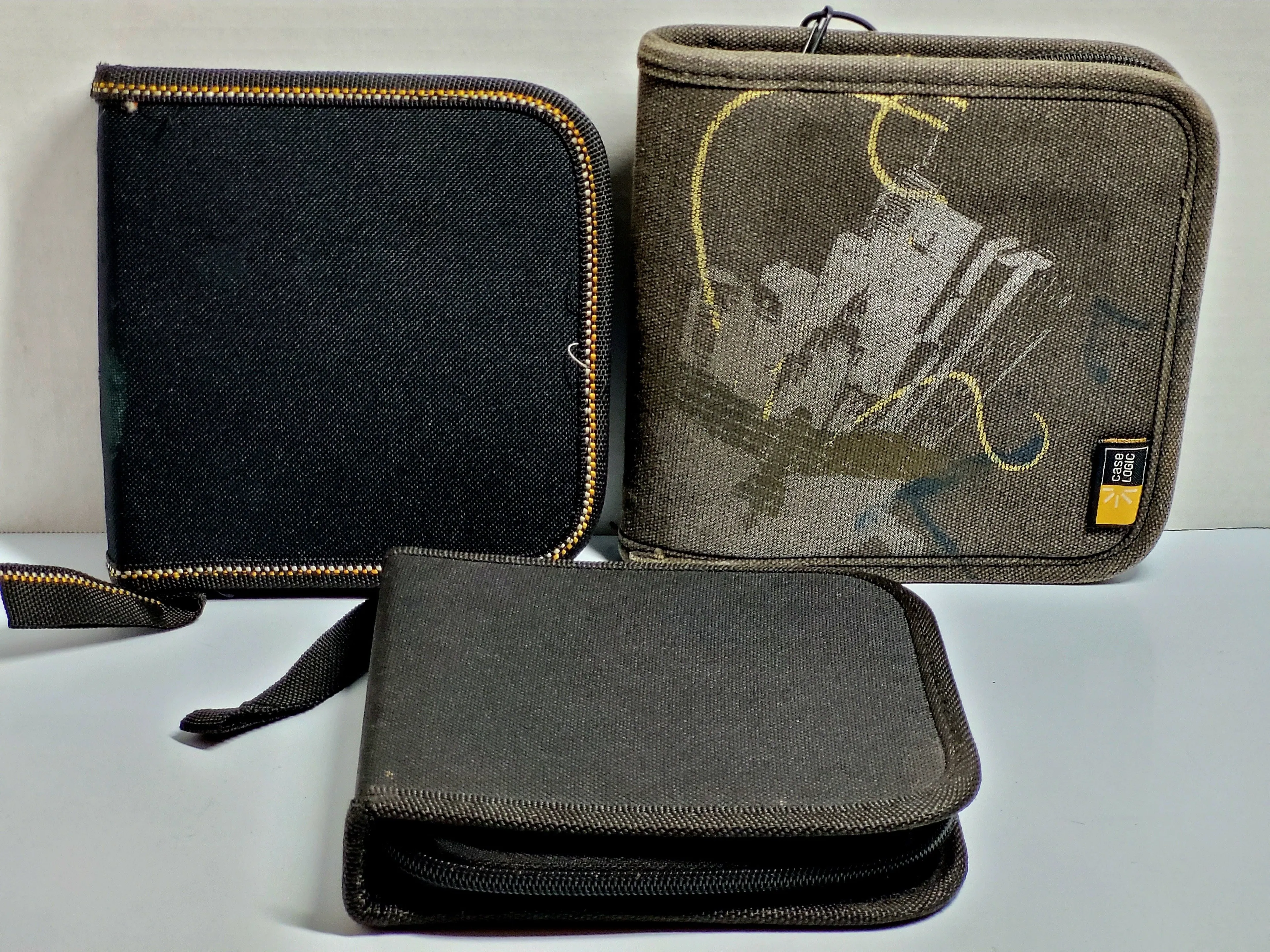 Product image for (Lot Of 3) Vintage CD/DVD 12 Page 24 Slot Storage Canvas Zipper Binder Holders. One Binder has been 