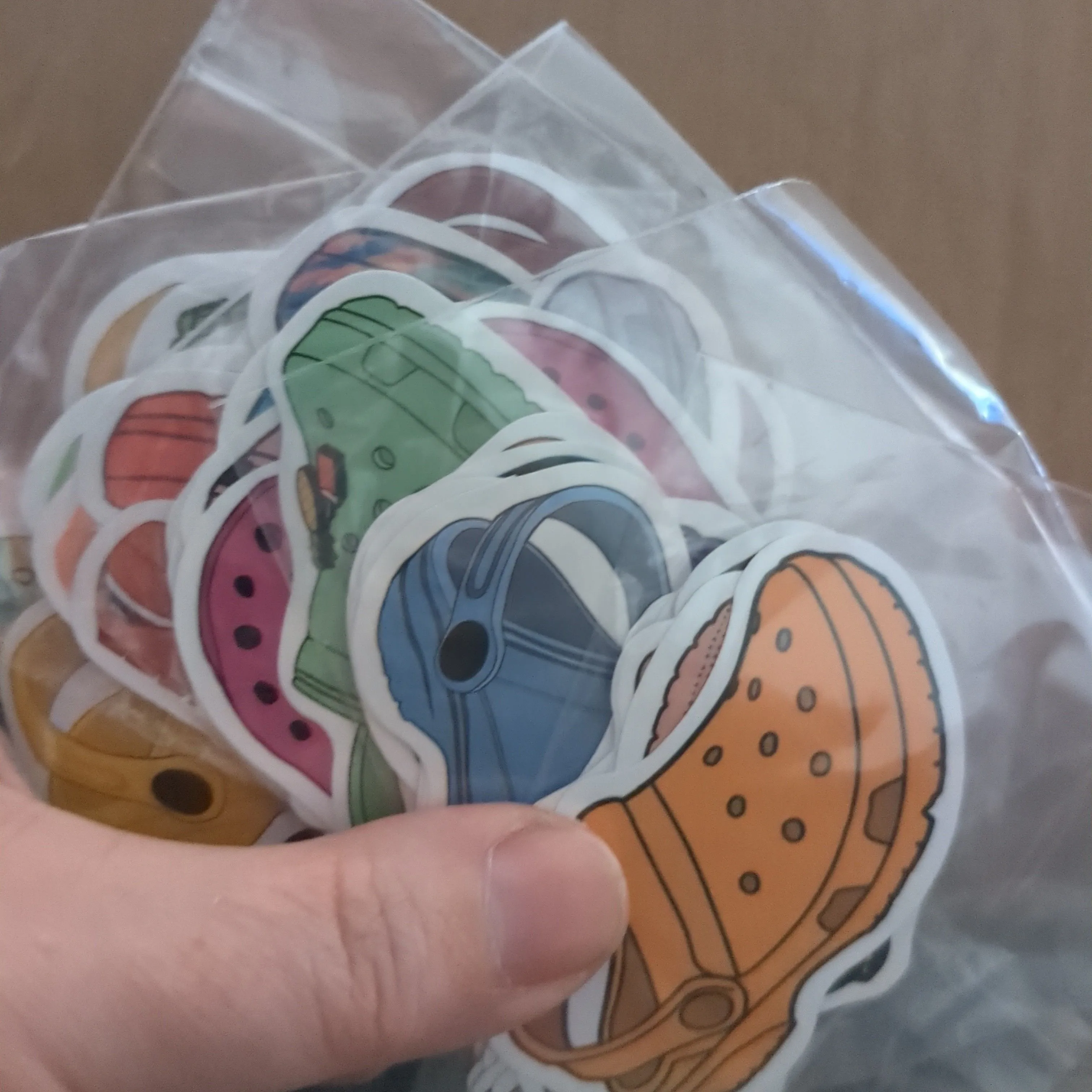 Product image for CHEAP ASS SHIPPING small handful of Crocs stickers