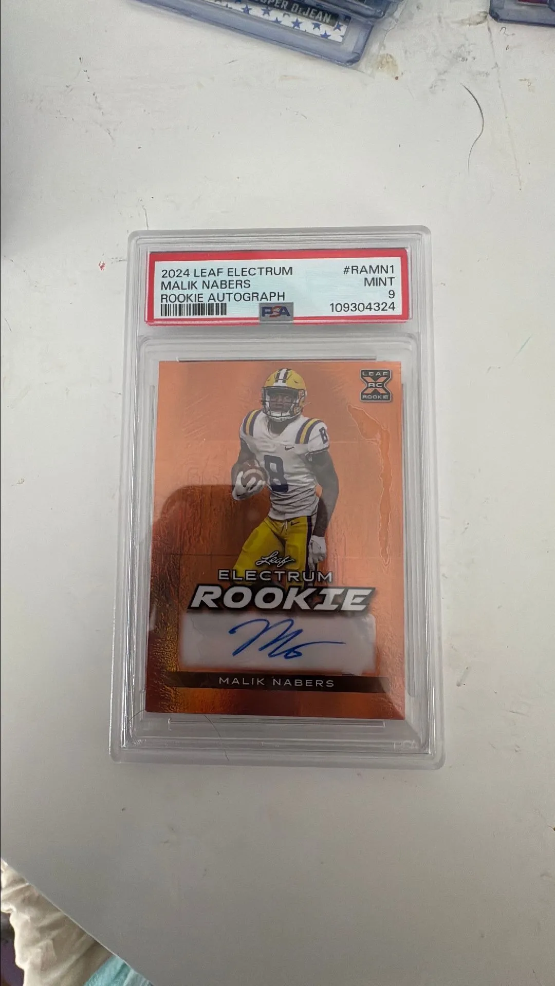 Product image for 2024 Electrum Malik Nabers Rookie Autograph 57/59 PSA 9 POP 1