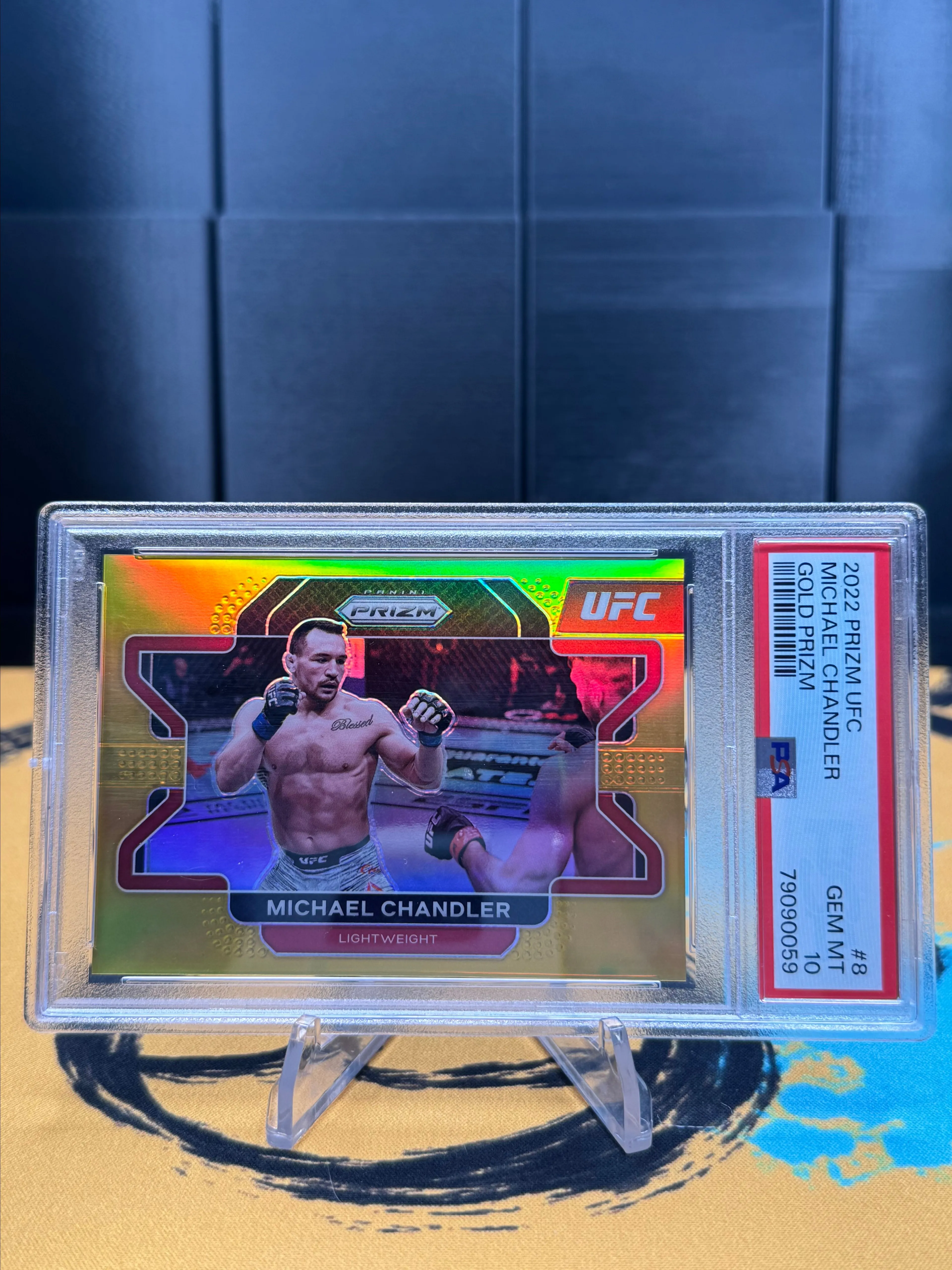 Product image for UFC 2022 Michael Chandler Gold Prizm /10 PSA 10