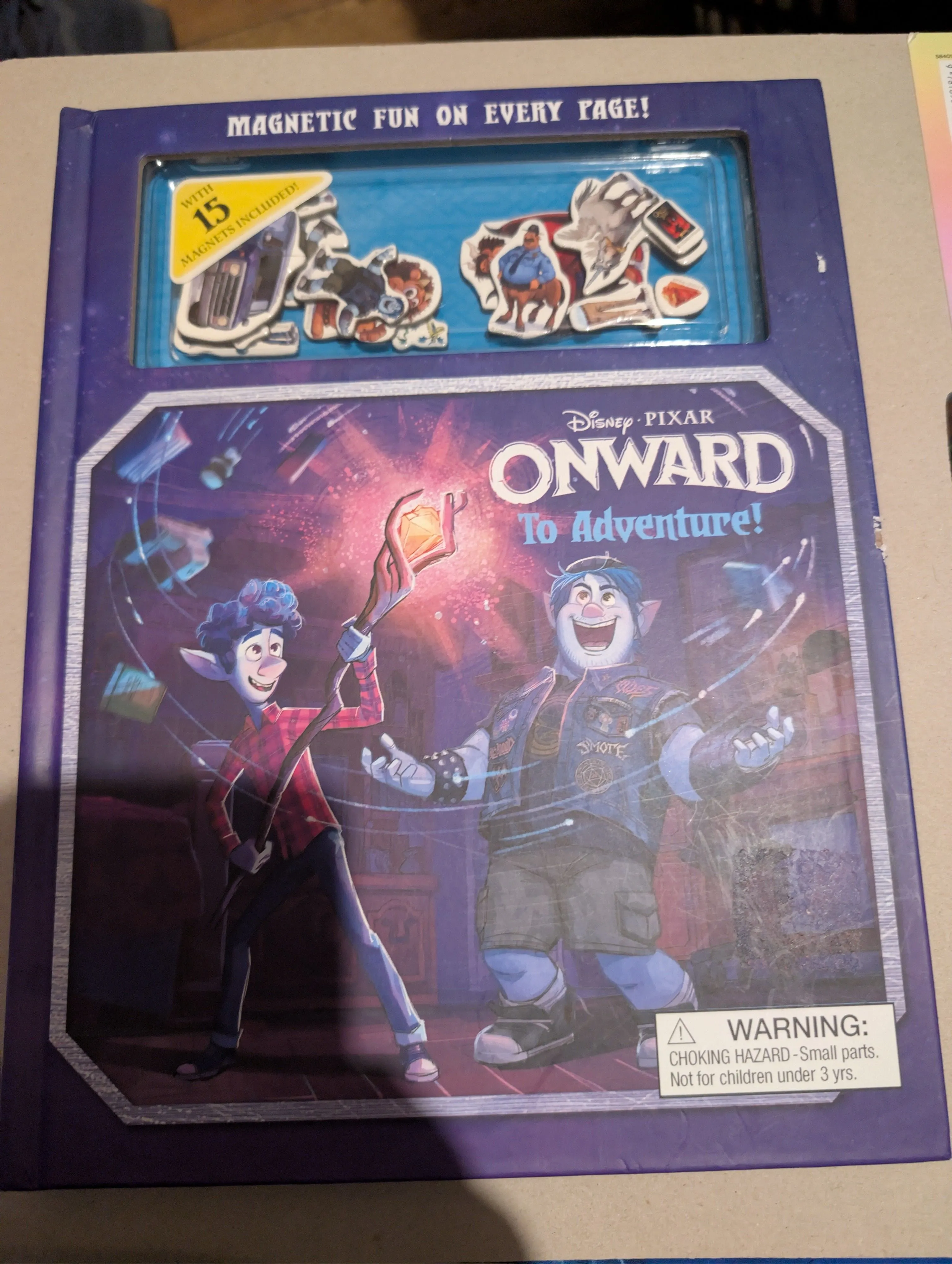 Product image for Disney Pixar Onward: To Adventure!" magnetic book, designed for interactive play 