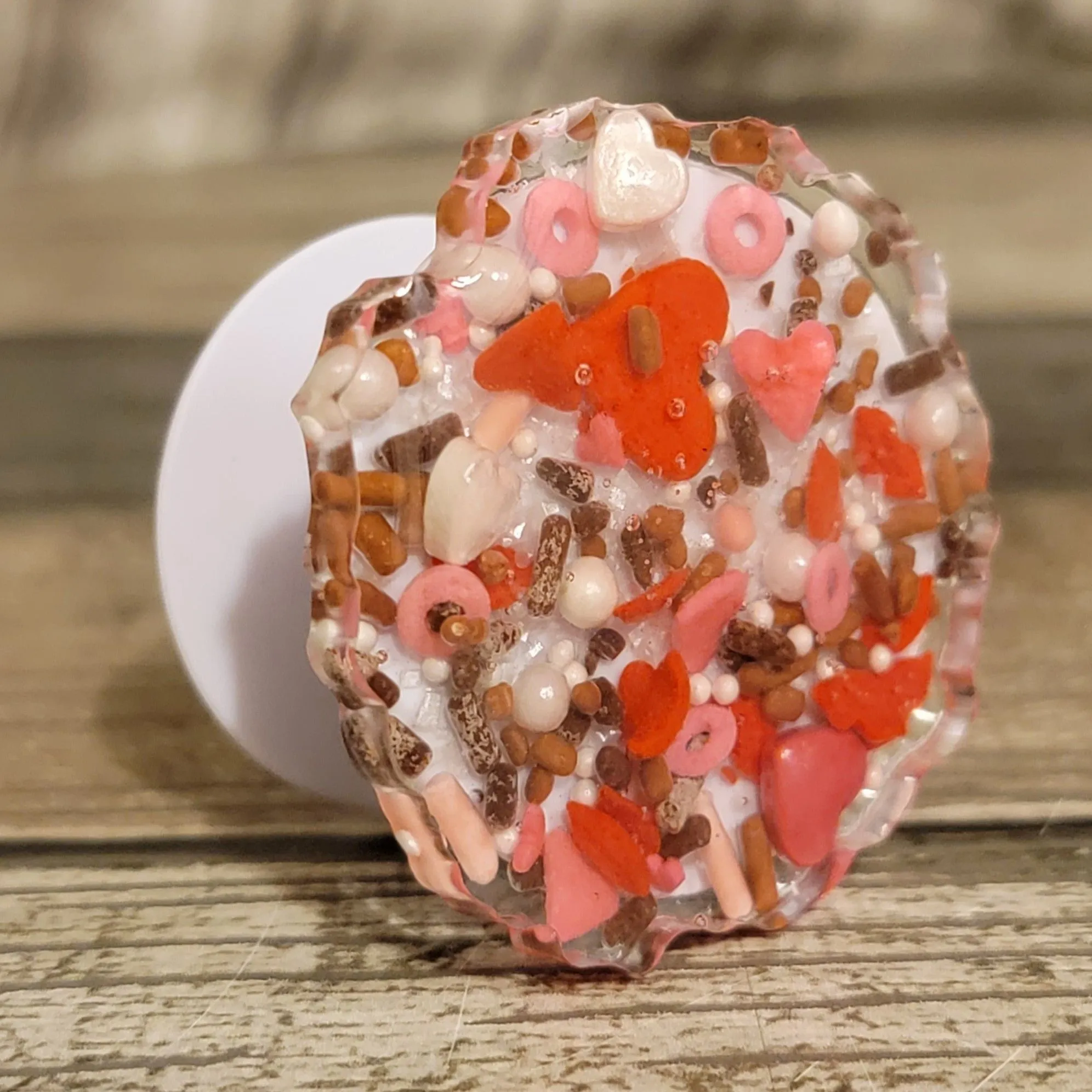 Product image for Hearts Sprinkles OddShaped Phone Socket/Holder