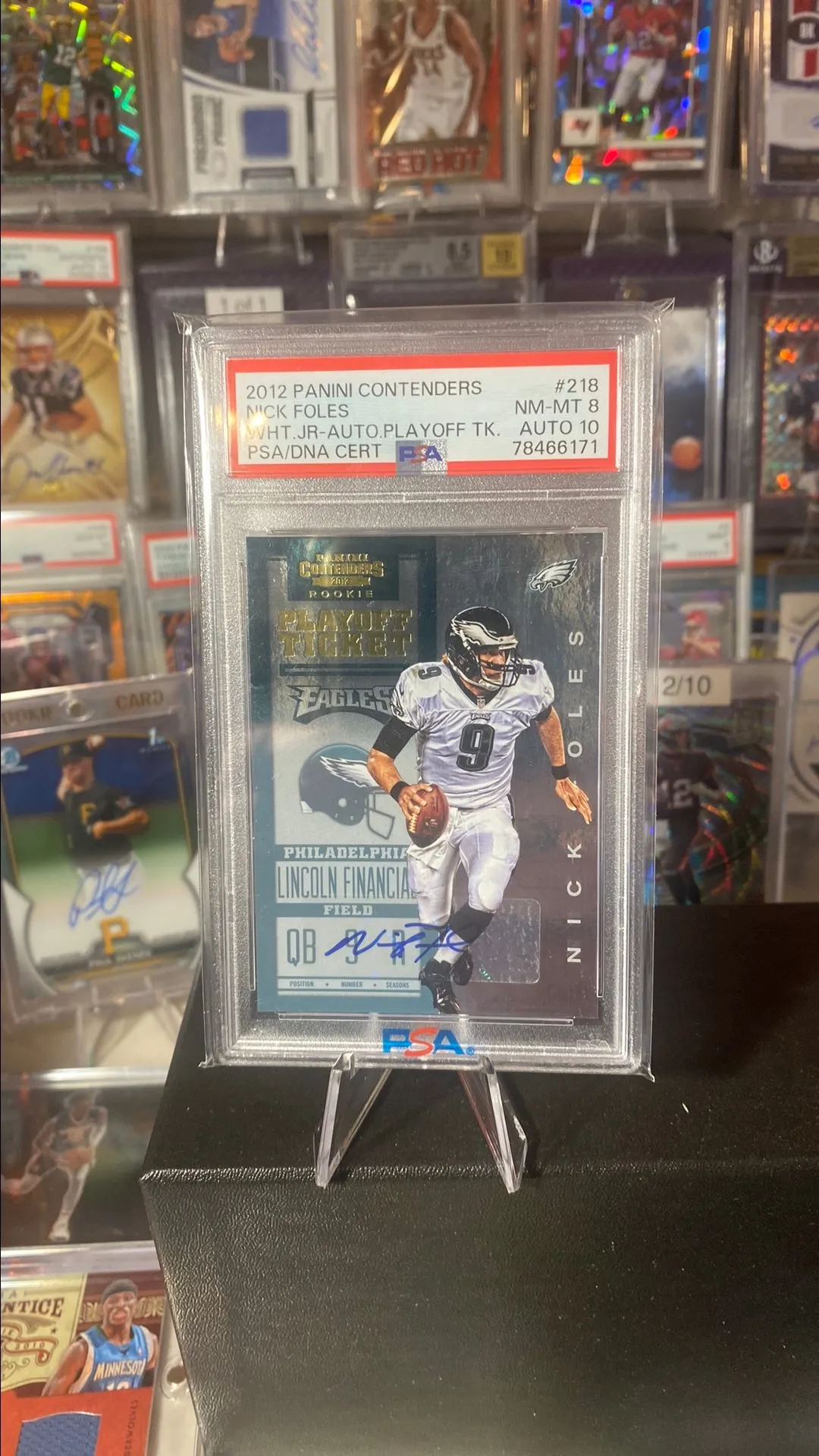 Product image for 2012 Contenders Nick Foles white jersey rookie auto/99 psa 8 auto 10