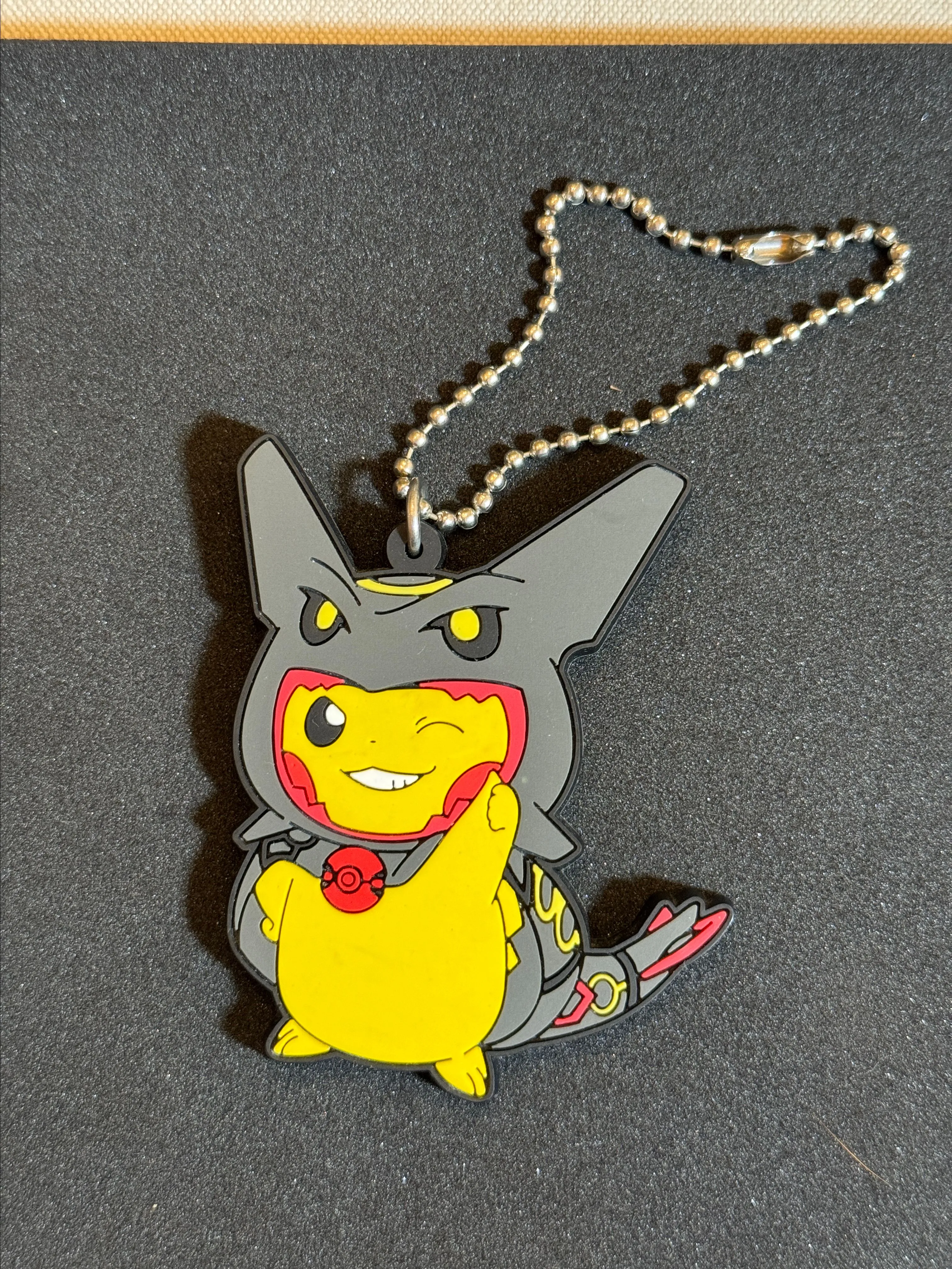 Product image for Pokemon Center shiny Rayquaza Poncho Pikachu Rubber Keychain