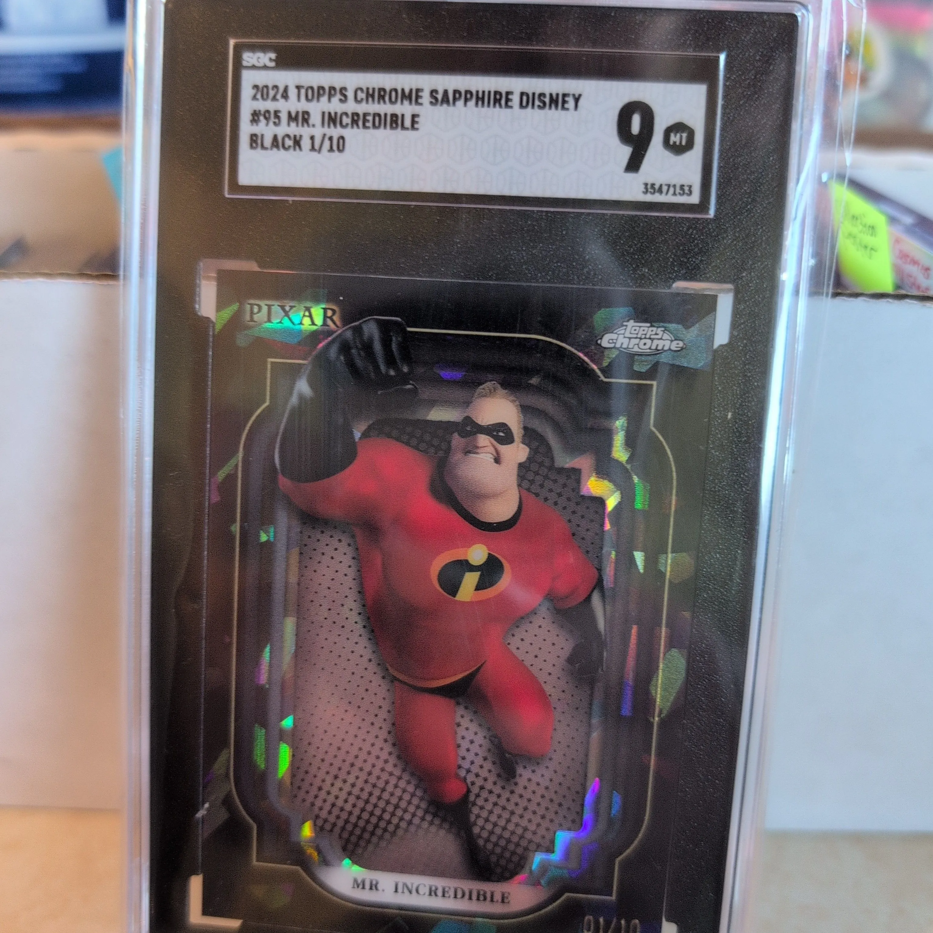 Product image for 2024 Topps Chrome Sapphire Disney Black 1/10 Mr. Incredible SGC 9
