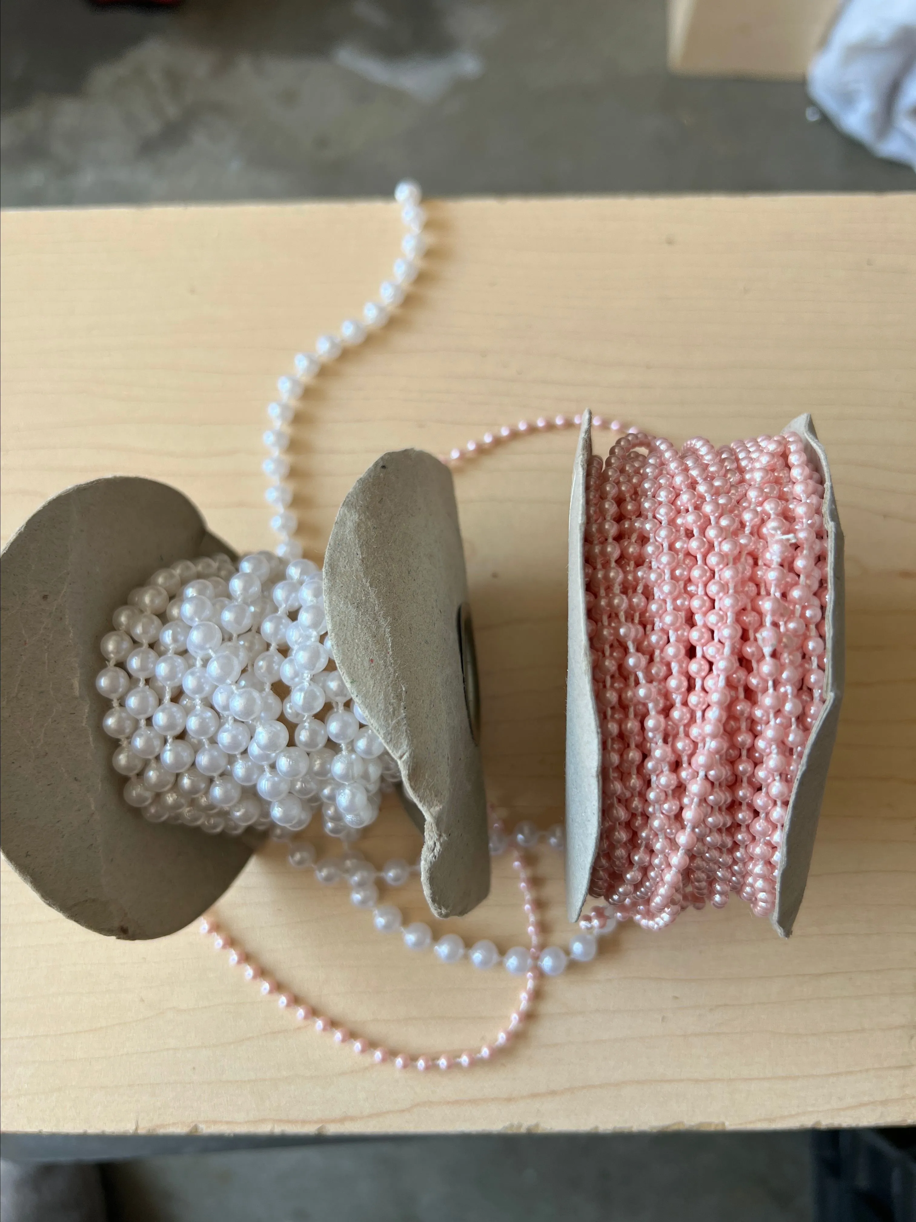 Product image for Roll of white pearls and pink pearls. This is for both rolls