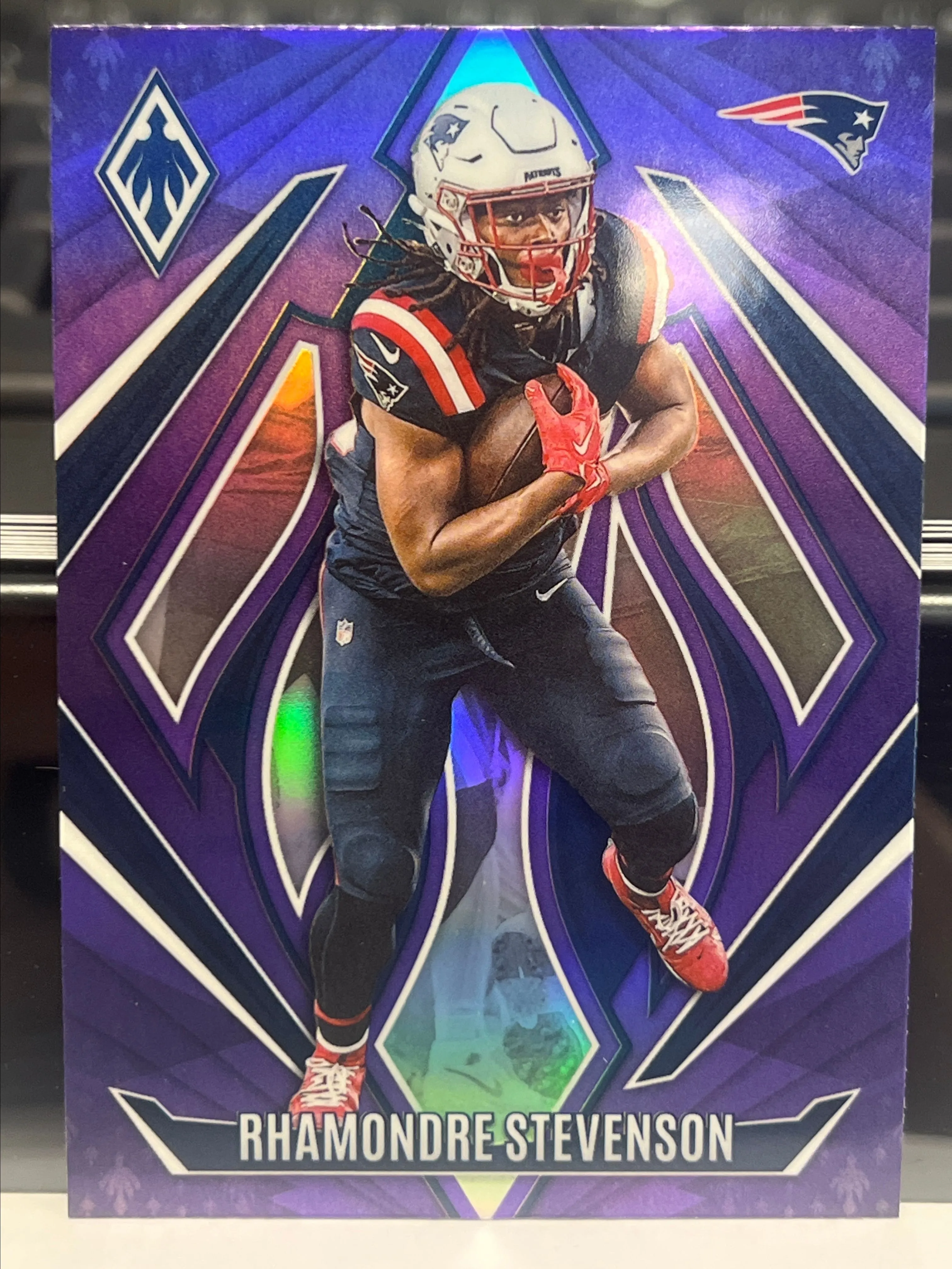 Product image for 2024 Panini PHOENIX FOOTBALL #124 RHAMONDRE STEVENSON PURPLE FADE PATRIOTS