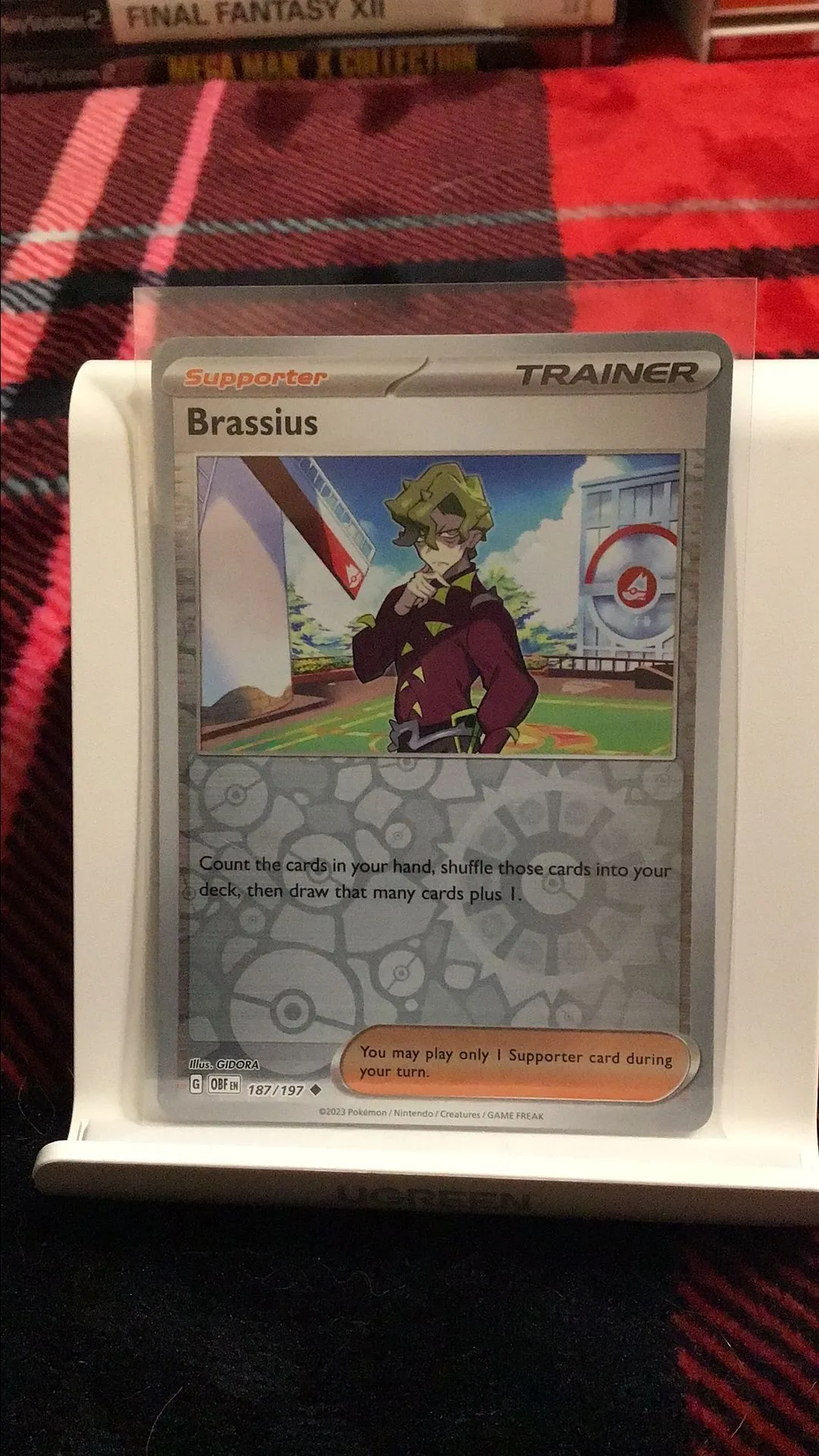 Product image for Brassius reverse Holo obsidian flames